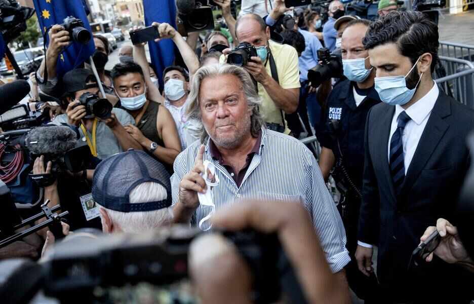 President Donald Trump's former chief strategist Steve Bannon leaves federal court after pleading not guilty to charges that he ripped off donors to an online fundraising scheme to build a wall on the US border with Mexico. Photo: AP
