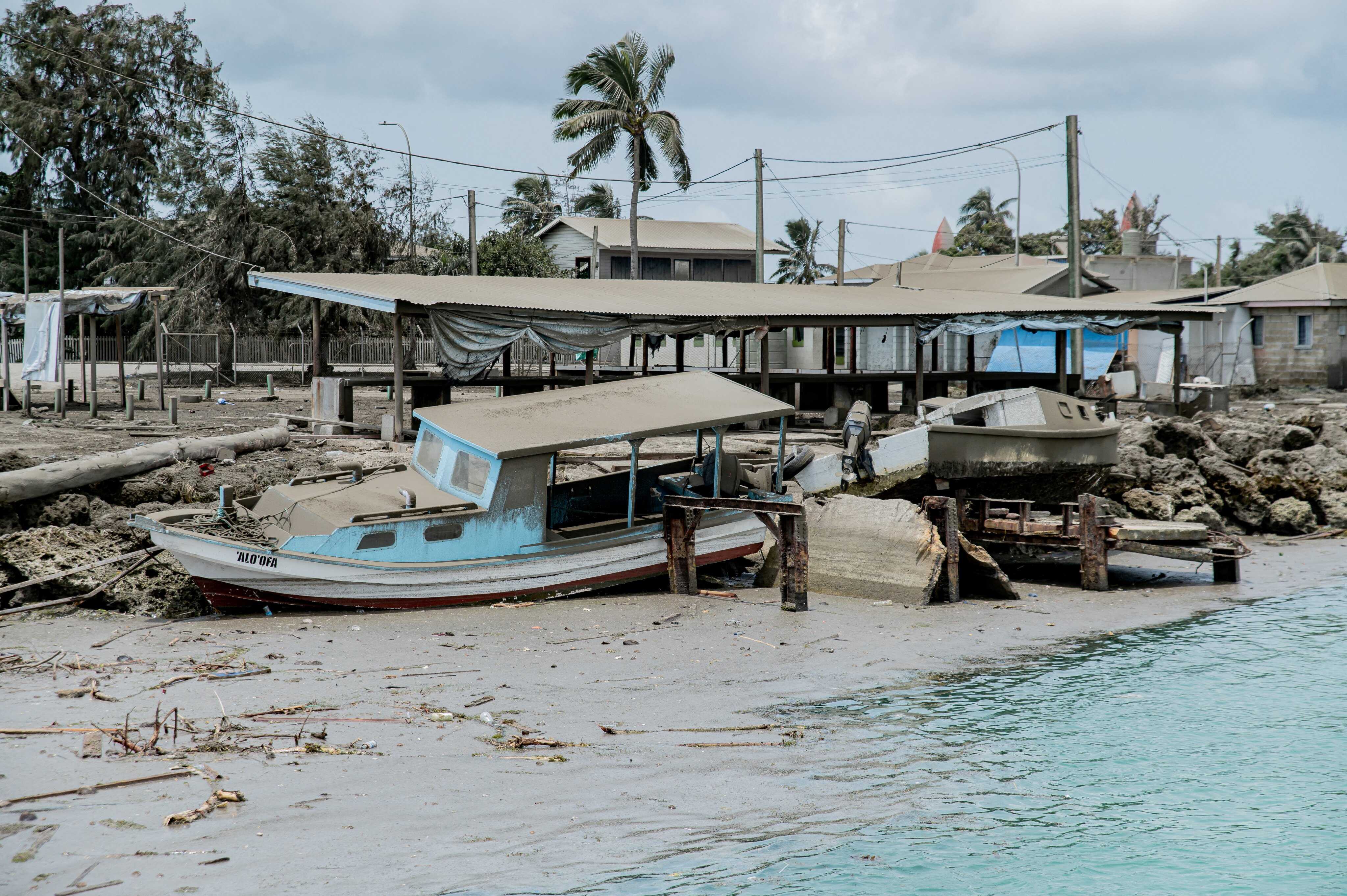 Buildings in Tonga have been damaged following a massive volcanic eruption and tsunami. Photo: Malau Media via Reuters