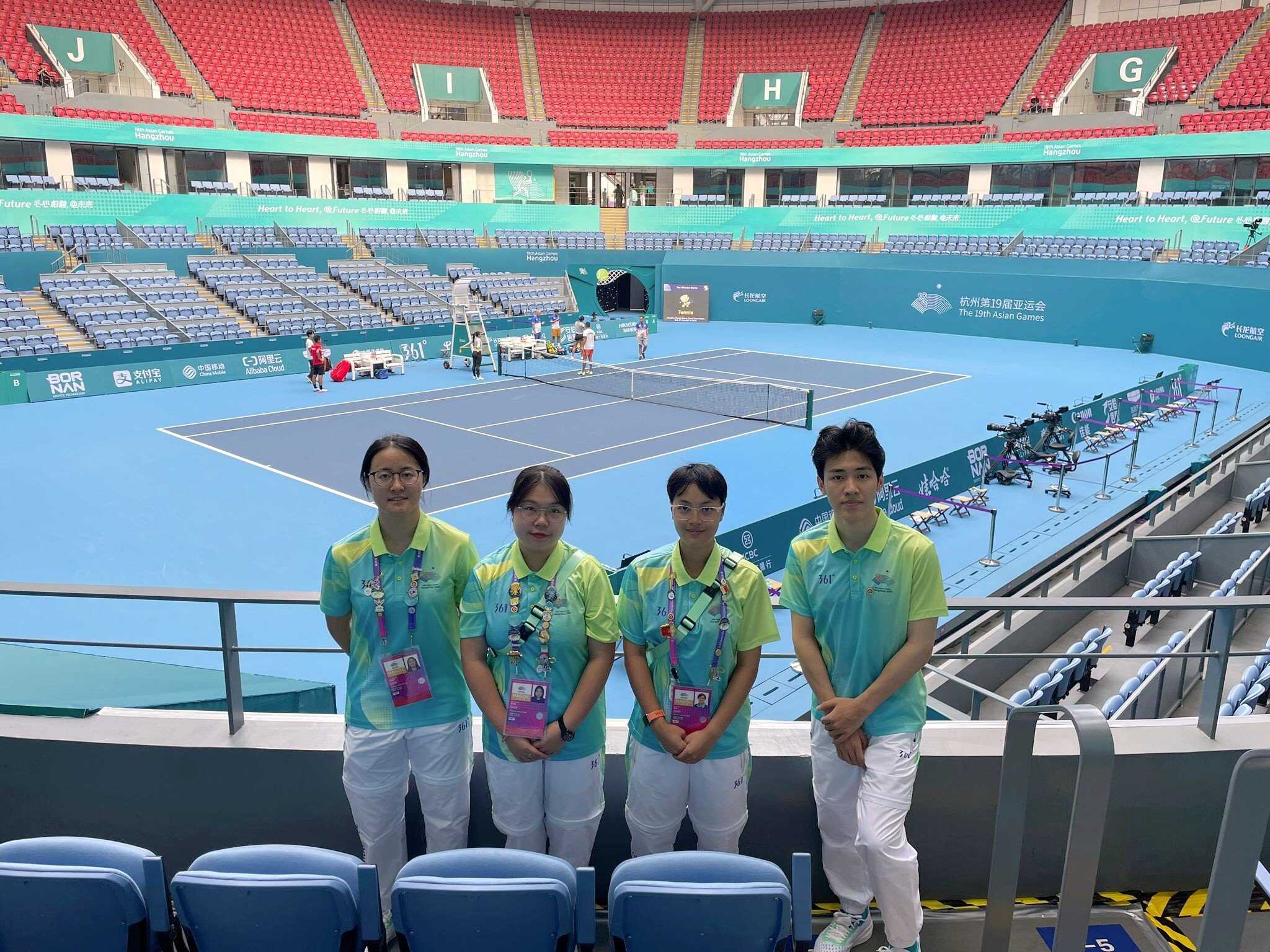(From left) Candy Liu, Laura Zeng, Siu Ying and Henry He were assigned to perform their volunteering duties at the Hangzhou Olympic Sports Centre Tennis Centre during the 2023 Asian Games. Photo: Handout