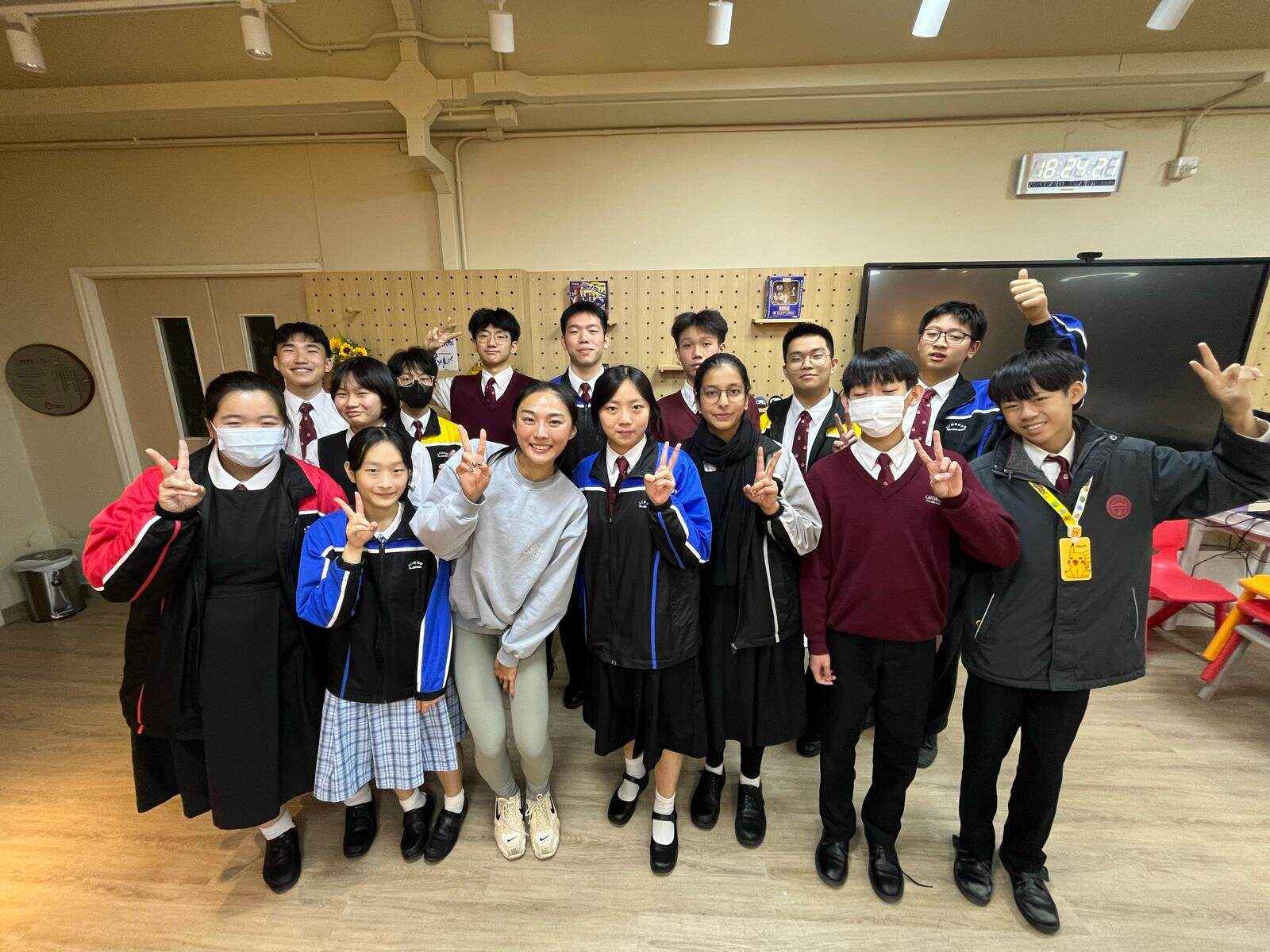 Cecilia Yeung Man-wai with student journalists at Lingnan Dr Chung Wing Kwong Memorial Secondary School. Photo: Handout
