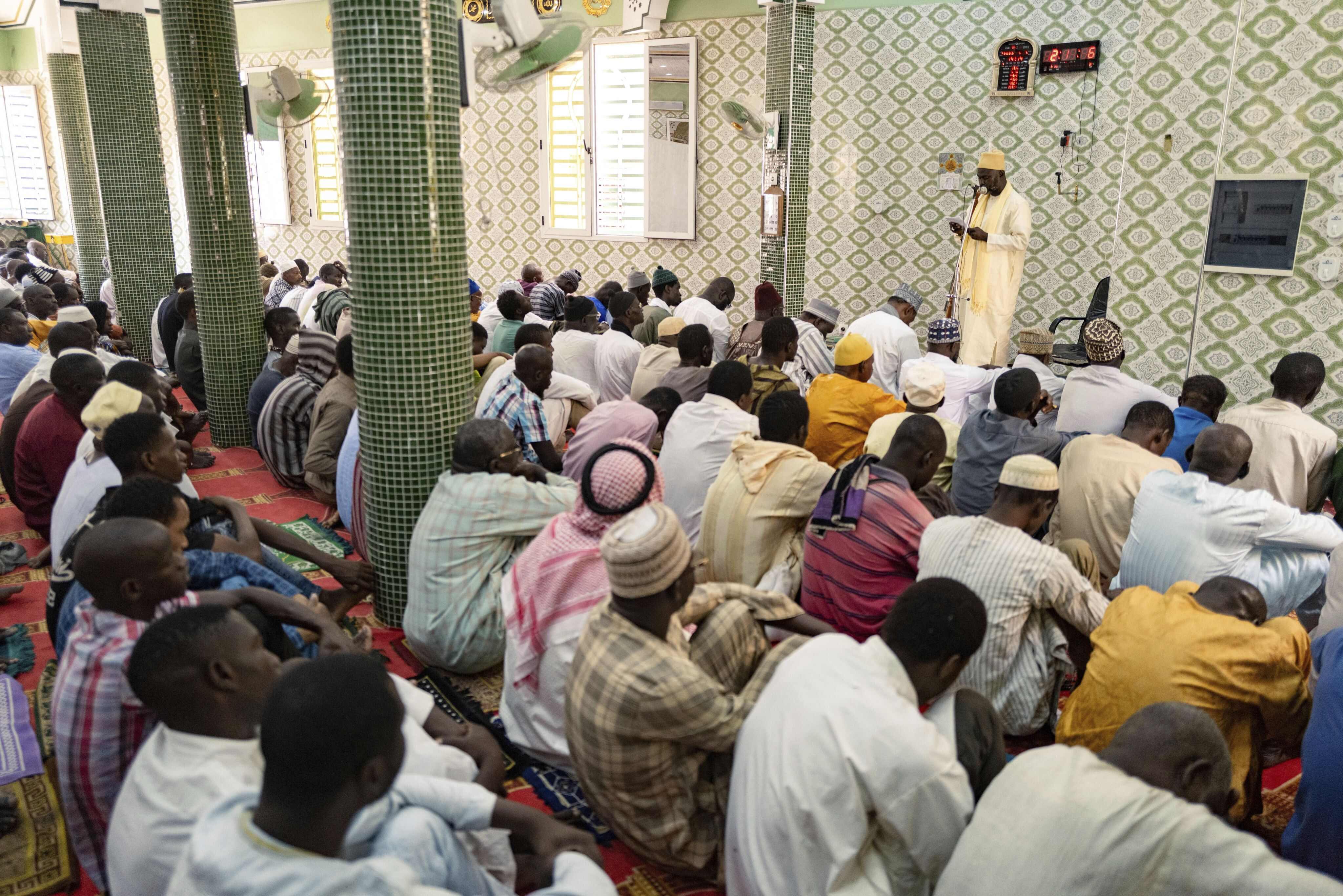 Imam Ibrahima Diane, an advocate for gender equality and an end to harmful practices like FGM and gender-based violence, delivers a sermon at the Great Mosque of Nietty Mbar in Thiaroye, a suburb of Dakar, Senegal. Photo: AP