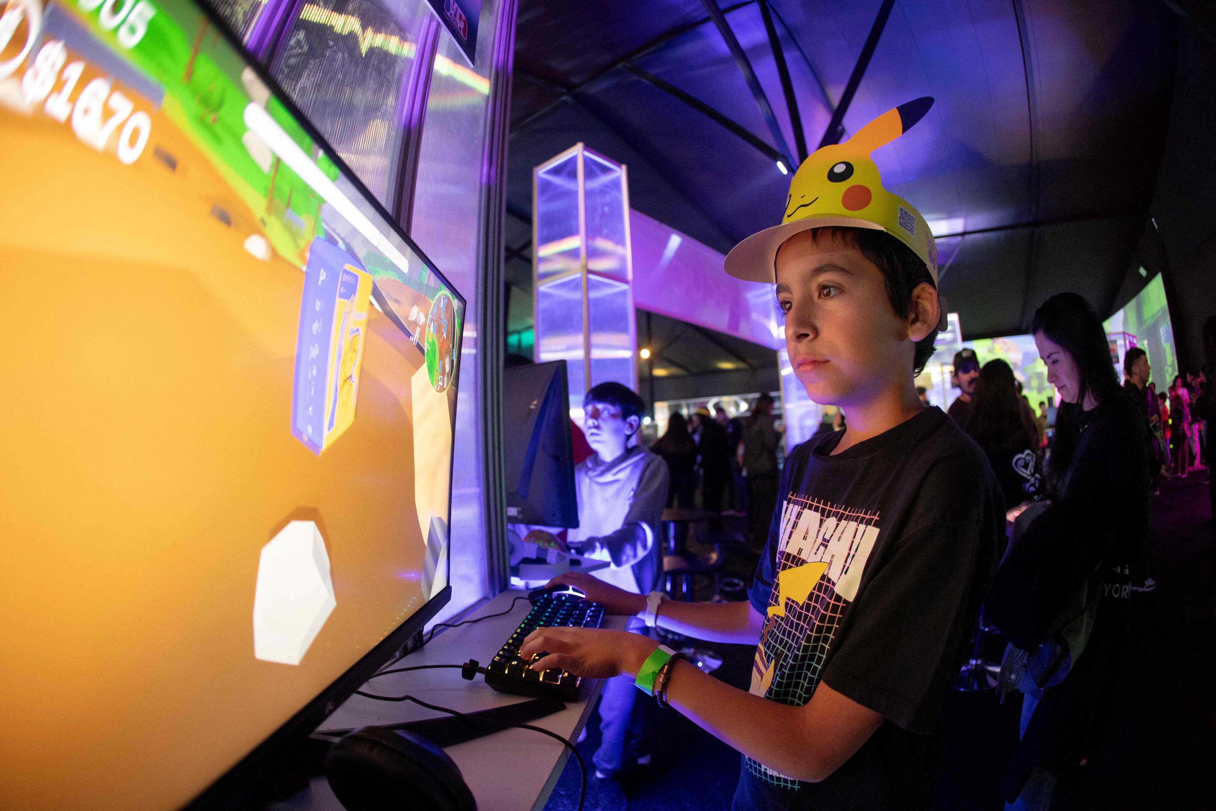 A boy plays a game at Festigame, an event that brings together video game developers and fans, in Santiago, Chile. Photo: AFP