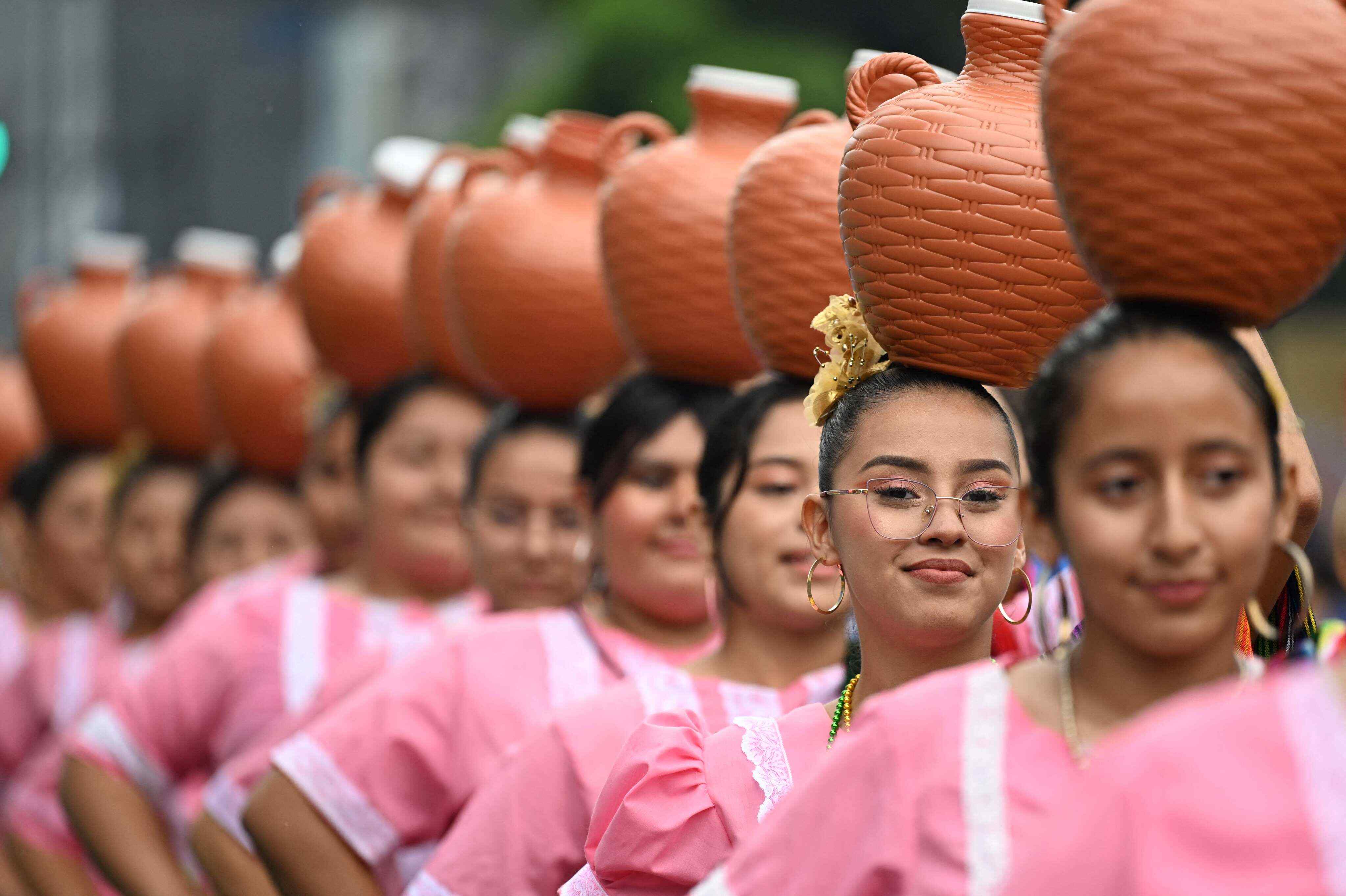 Students take part in a parade in the capital, San Salvador, to commemorate 204 years of El Salvador’s independence. Photo: AFP