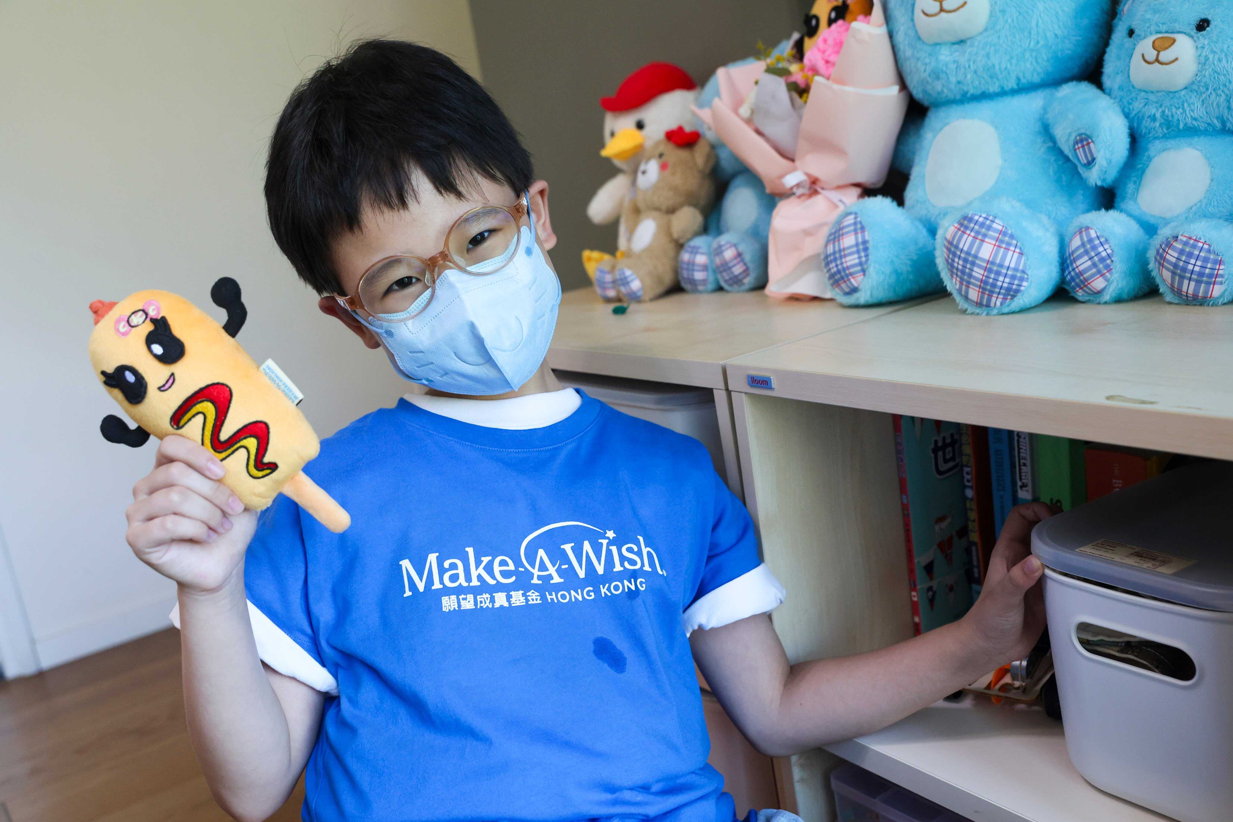 Sophie Chan poses with the plush toy she made, called Corny Ketchy. Photo: Edmond So