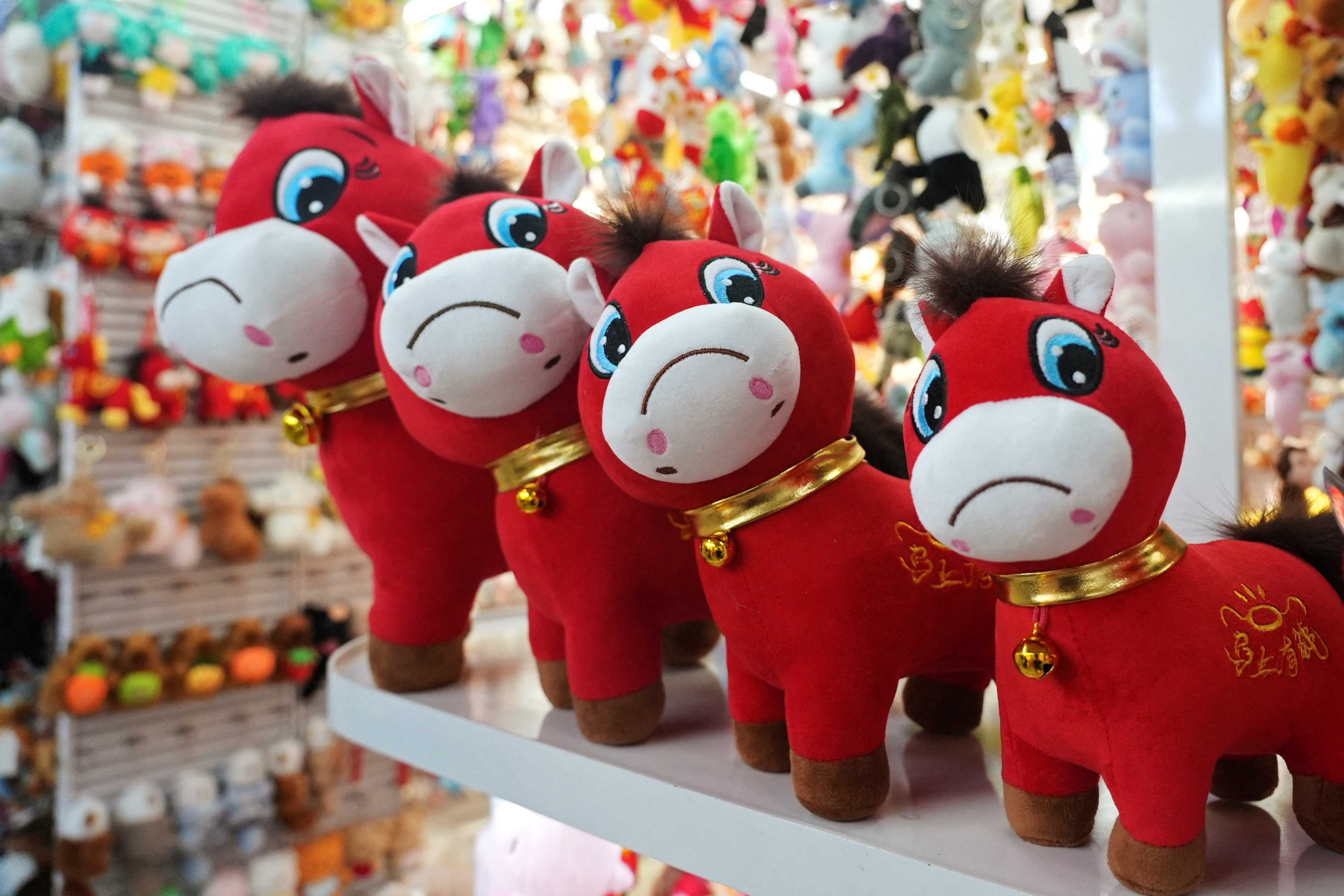A quirky red plush toy with a frown unexpectedly stole the spotlight ahead of the Lunar New Year. Photo: Reuters