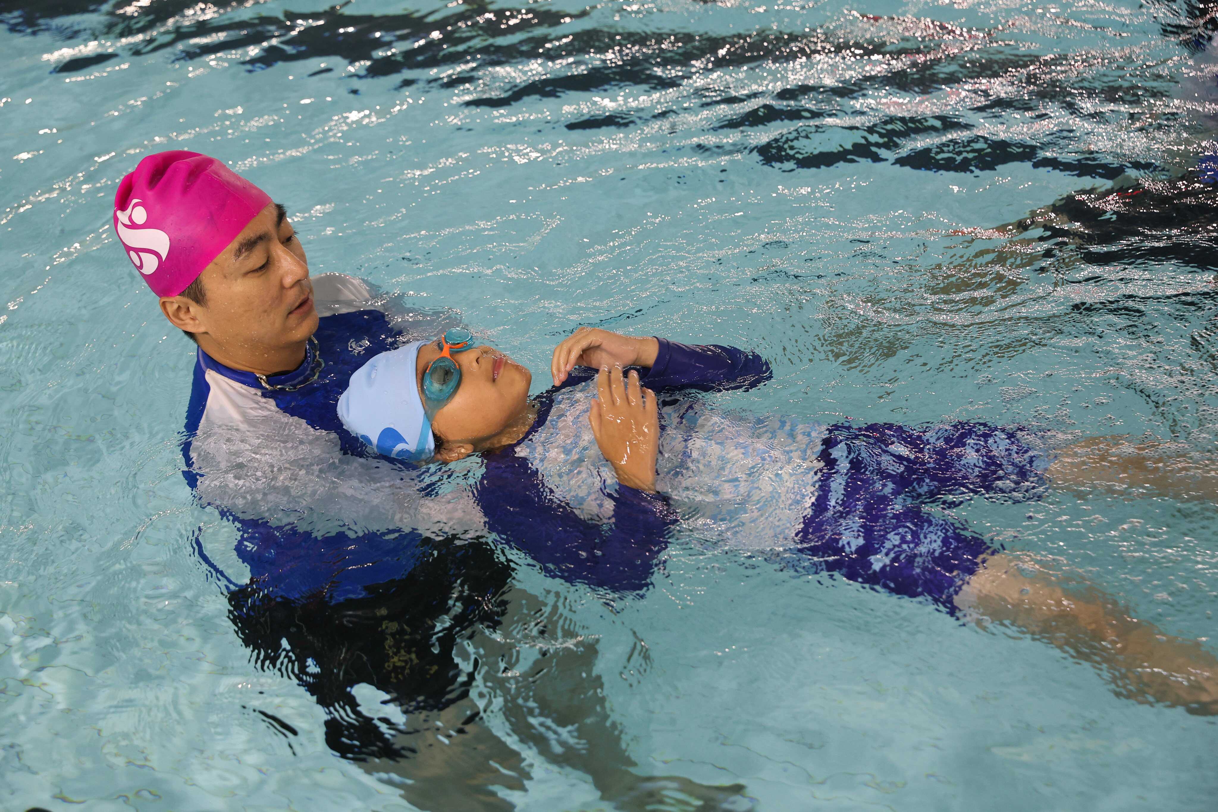 Swimming in kindergarten could boost physical and mental growth, but there are concerns about safety and feasibility. Photo: Edmond So