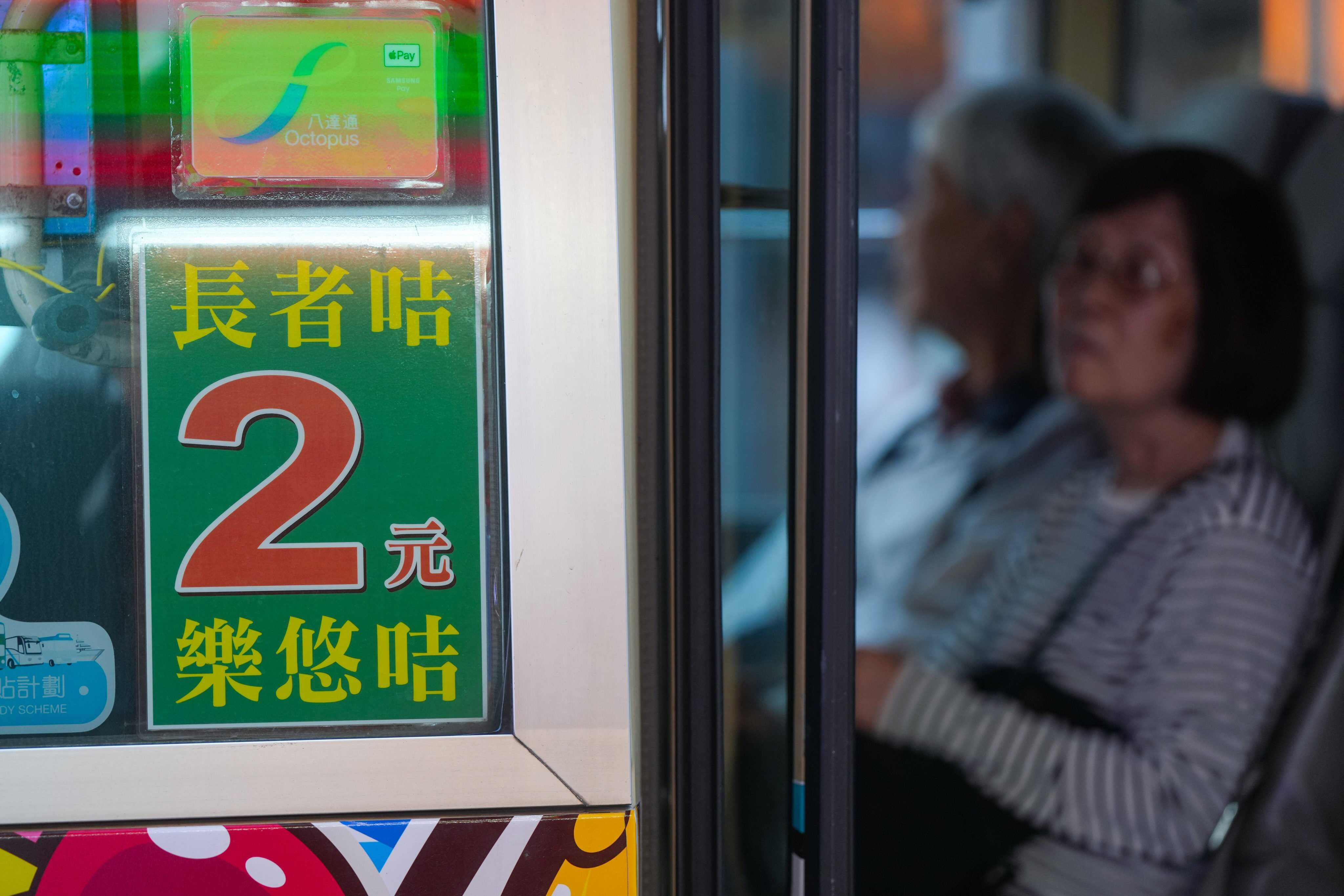 A sticker advertising Hong Kong’s HK$2 transport subsidy scheme for elderly and disabled passengers displayed on a minibus in Mong Kok. Photo: Sam Tsang