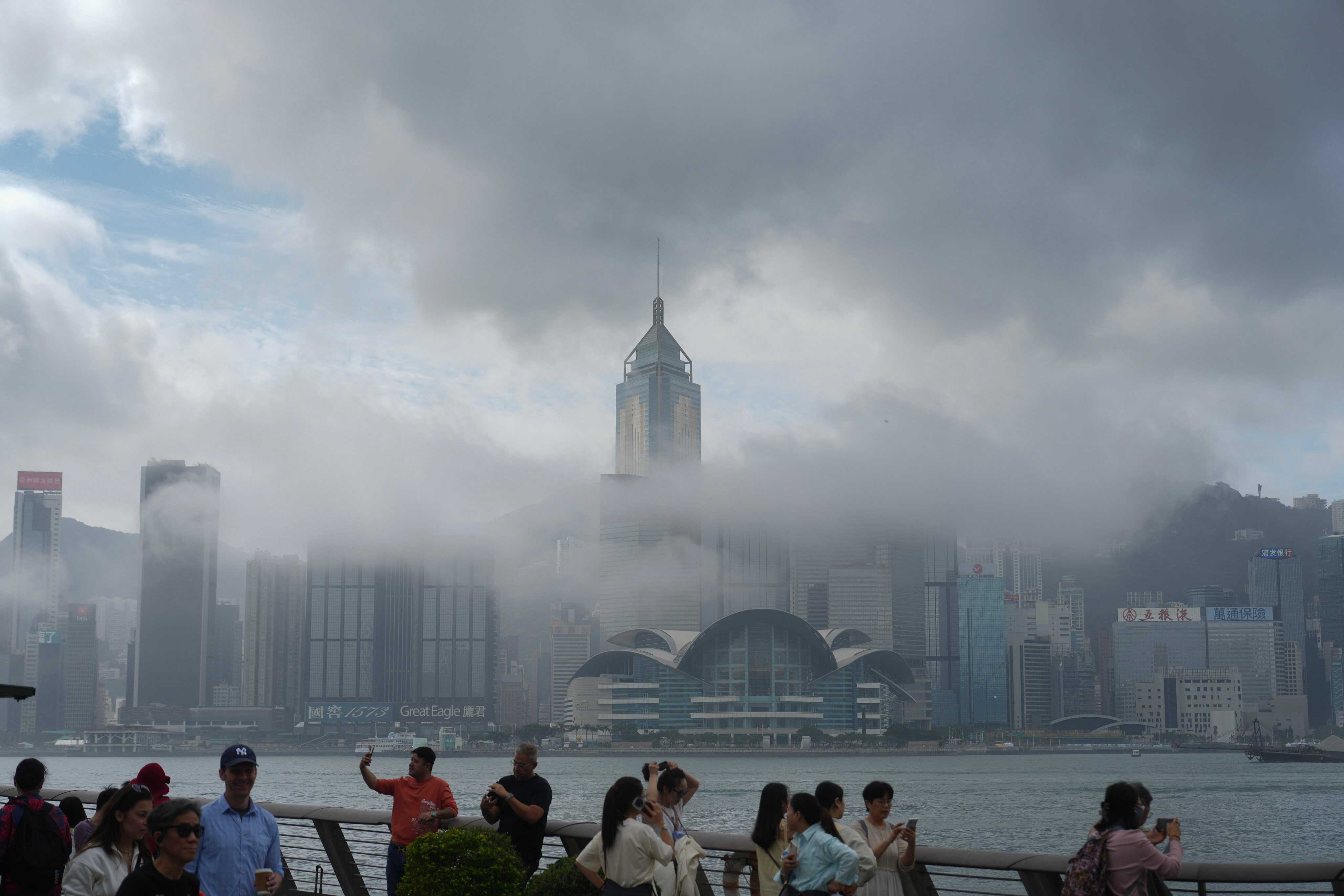 Foggy and humid weather at the waterfront in Tsim Sha Tsui earlier this month. In the week from Thursday onwards, relative humidity will range between 65 per cent and 95 per cent, according to the weather forecaster. Photo: Sam Tsang
