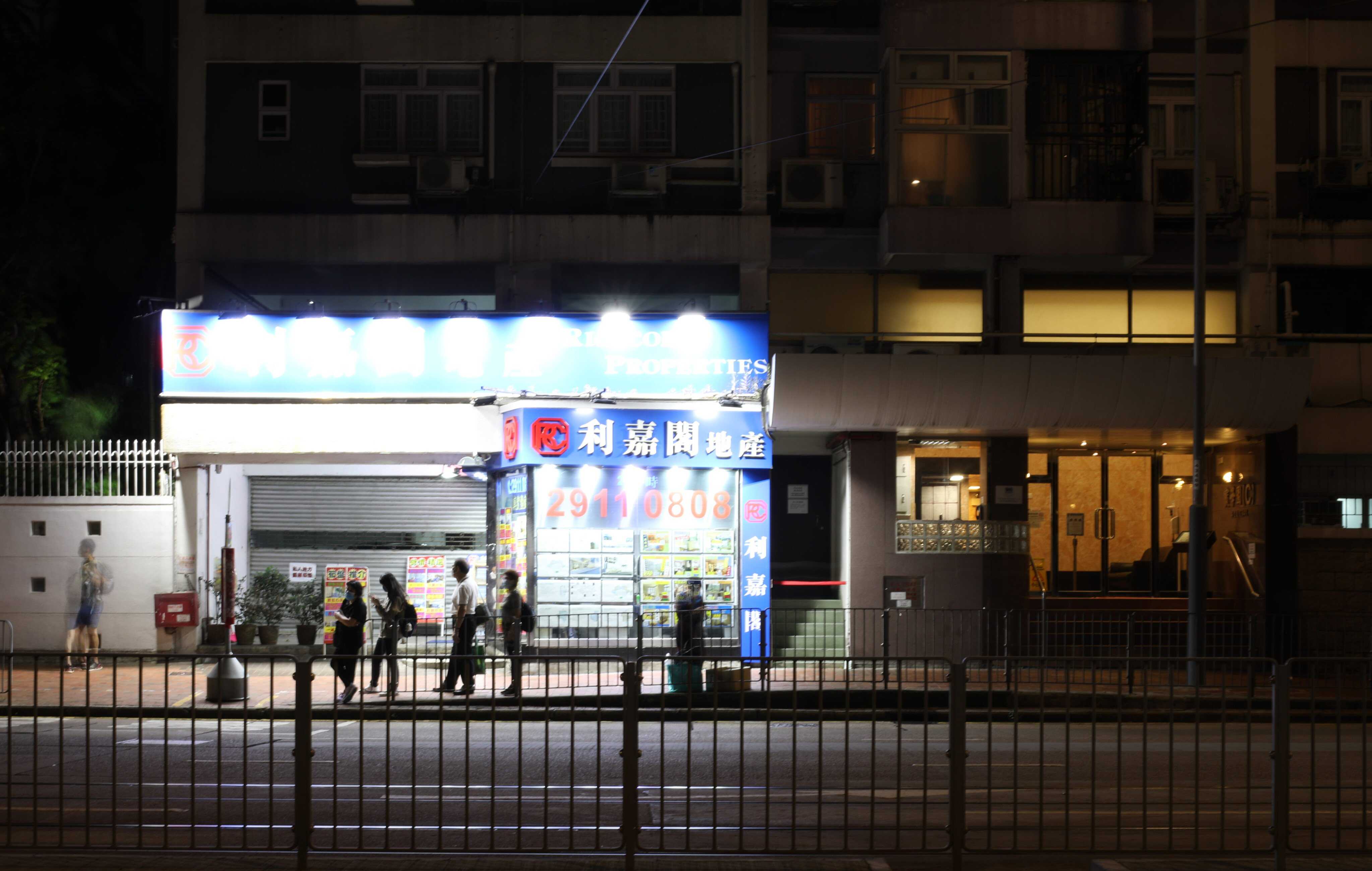 A storefront in Quarry Bay lit up at night, adding to the city’s light pollution. Photo: Robert Ng