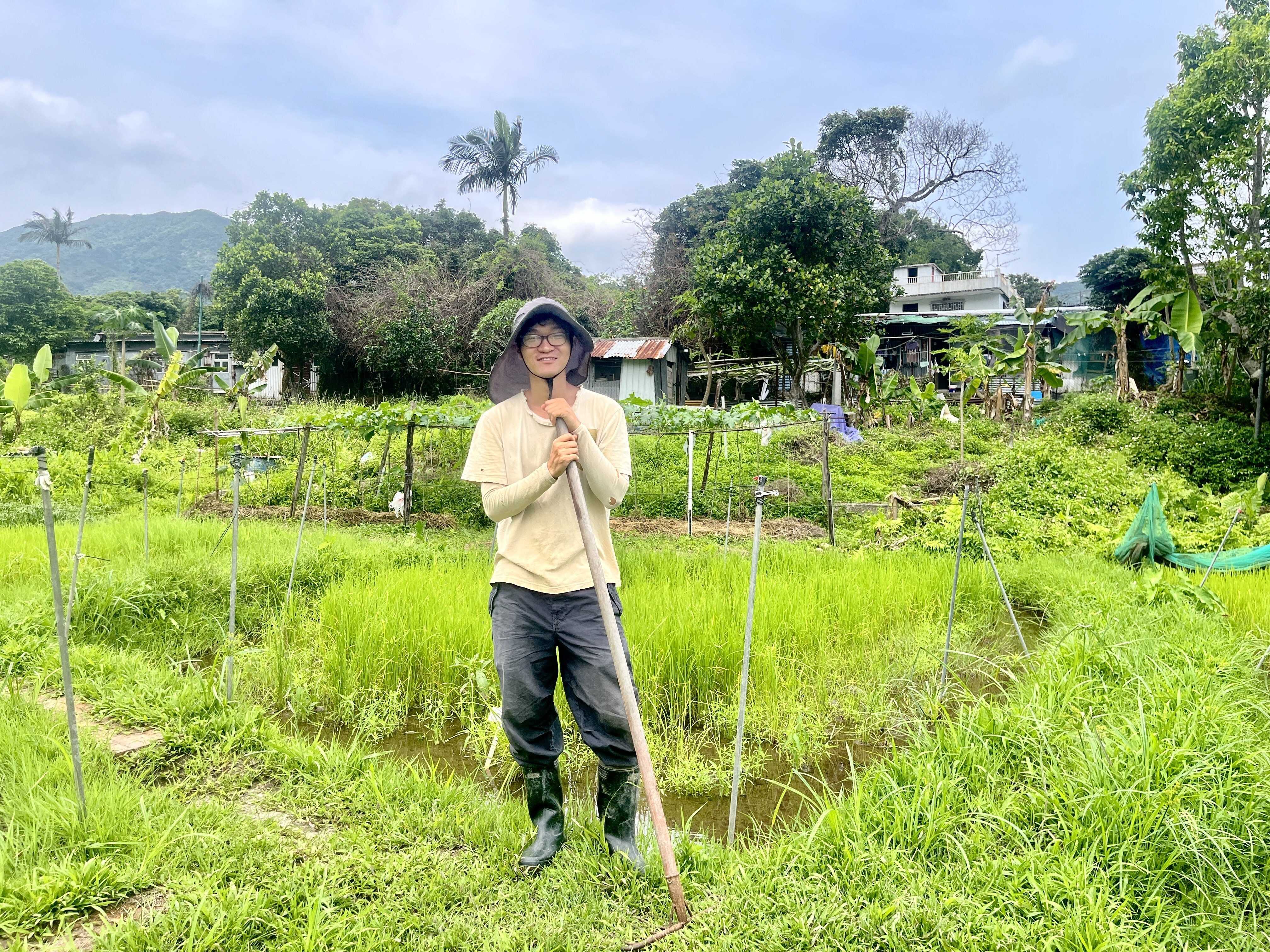 Young Hong Kong farmer Kwok Yau-wah fights climate challenges to revive native rice varieties and preserve local agriculture. Photo: Kelly Fung