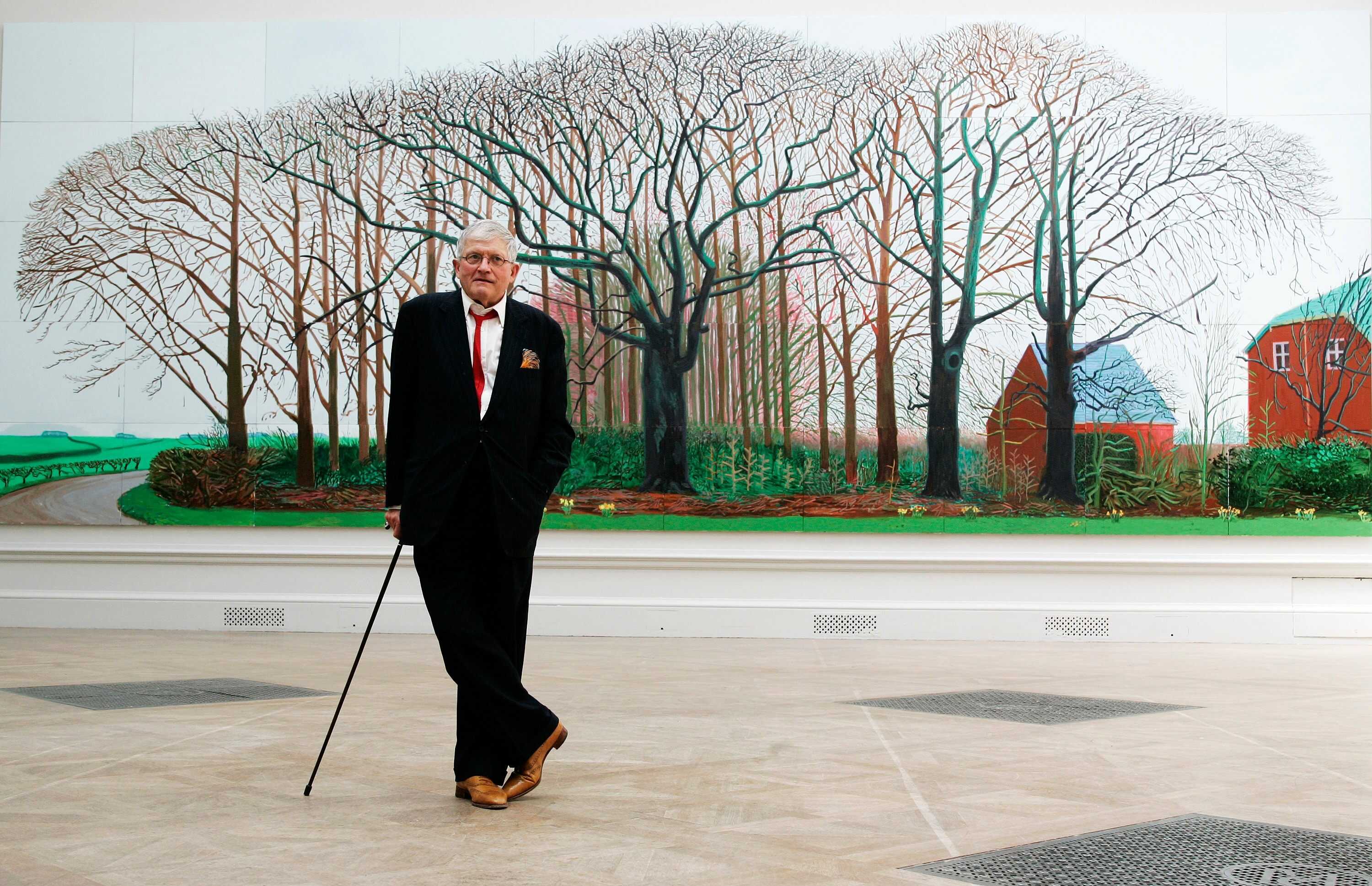 British artist David Hockney with his work "Bigger Trees Near Water", the largest painting ever shown at the Royal Academy’s Summer Exhibition, in London in 2007. Photo: AP