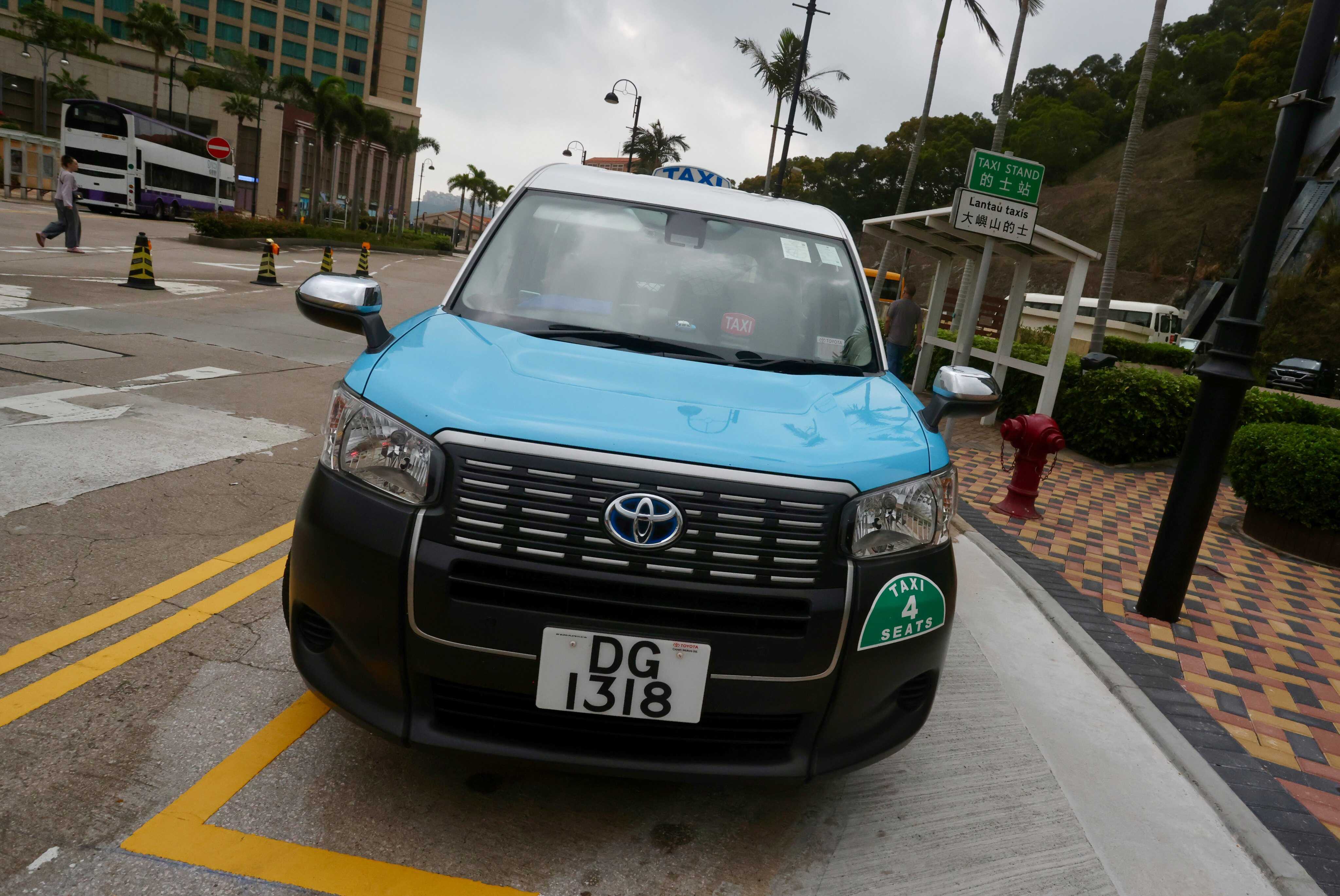 A Lantau taxi waiting at the Discovery Bay North Plaza taxi stand on Lantau Island. Currently, taxis are only allowed to go as far as this plaza. Photo: Jonathan Wong