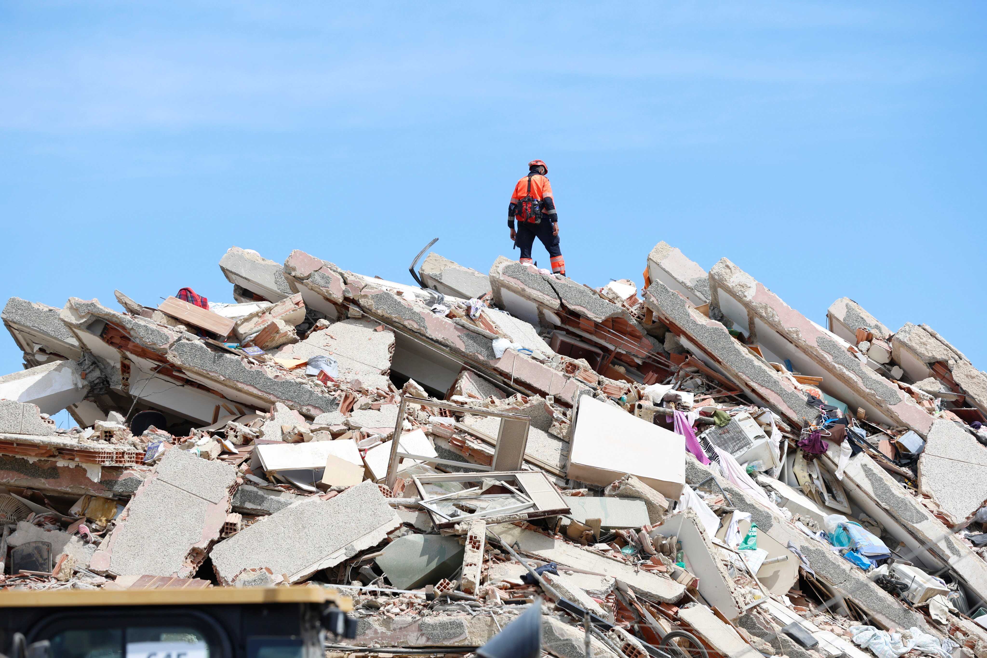 A rescuer stands on the rubble of a collapsed building in Caraballeda, La Guaira state, Venezuela, on June 28, 2026. Photo: Xinhua