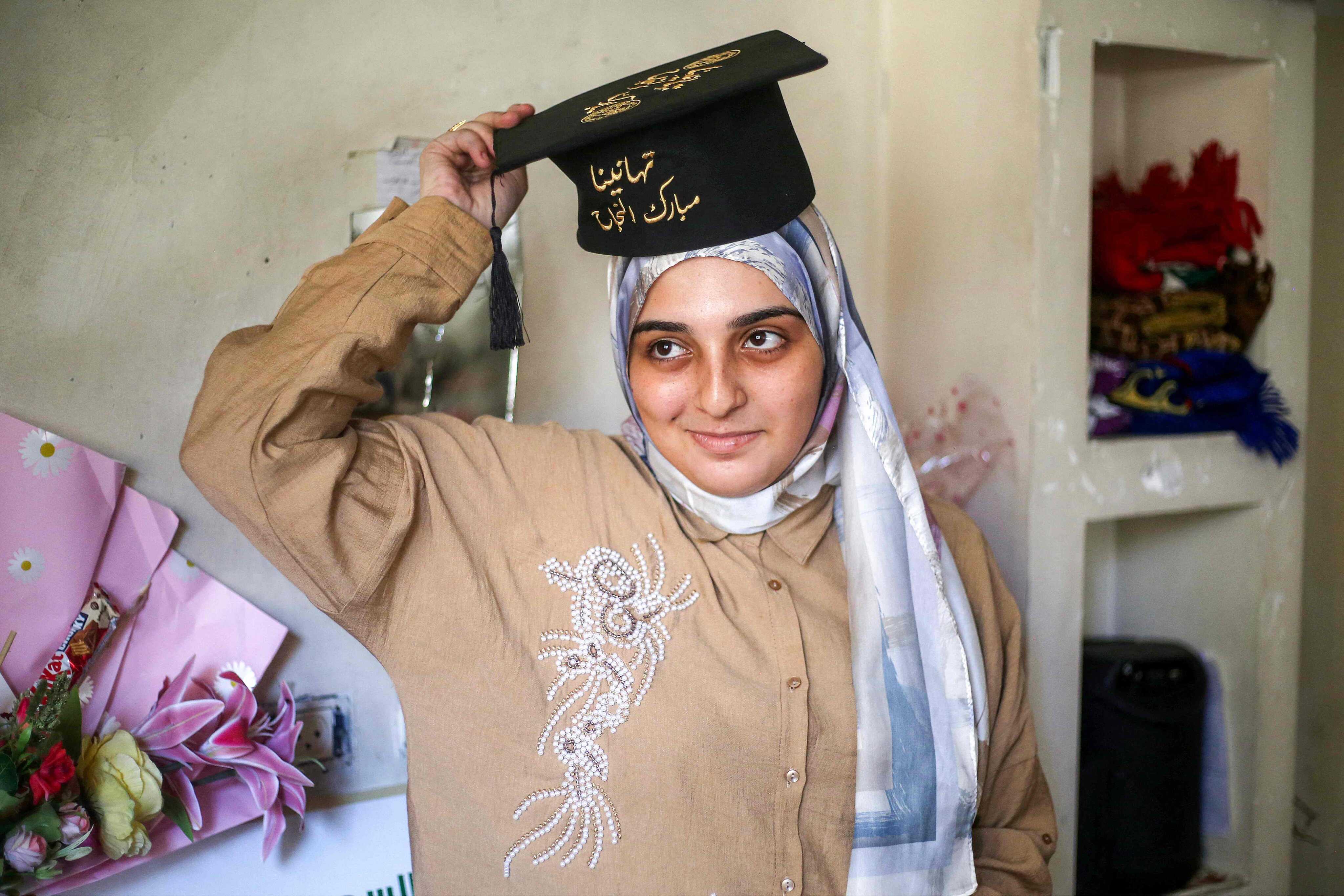 Palestinian secondary school student Saba Rabah in Gaza is the top-ranked student in the science stream of the Palestinian national high school exams. Photo: AFP