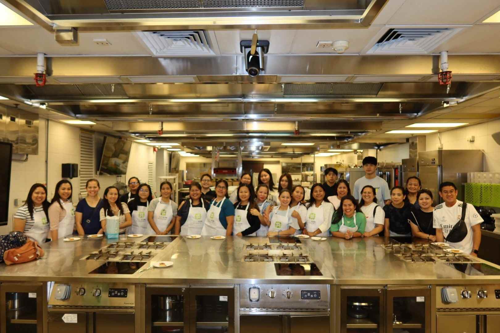 4HOME, a student-led group that invites the city’s domestic workers to share recipes and stories, hosts a Vietnamese cooking workshop at Hotel ICON. Photo: Handout