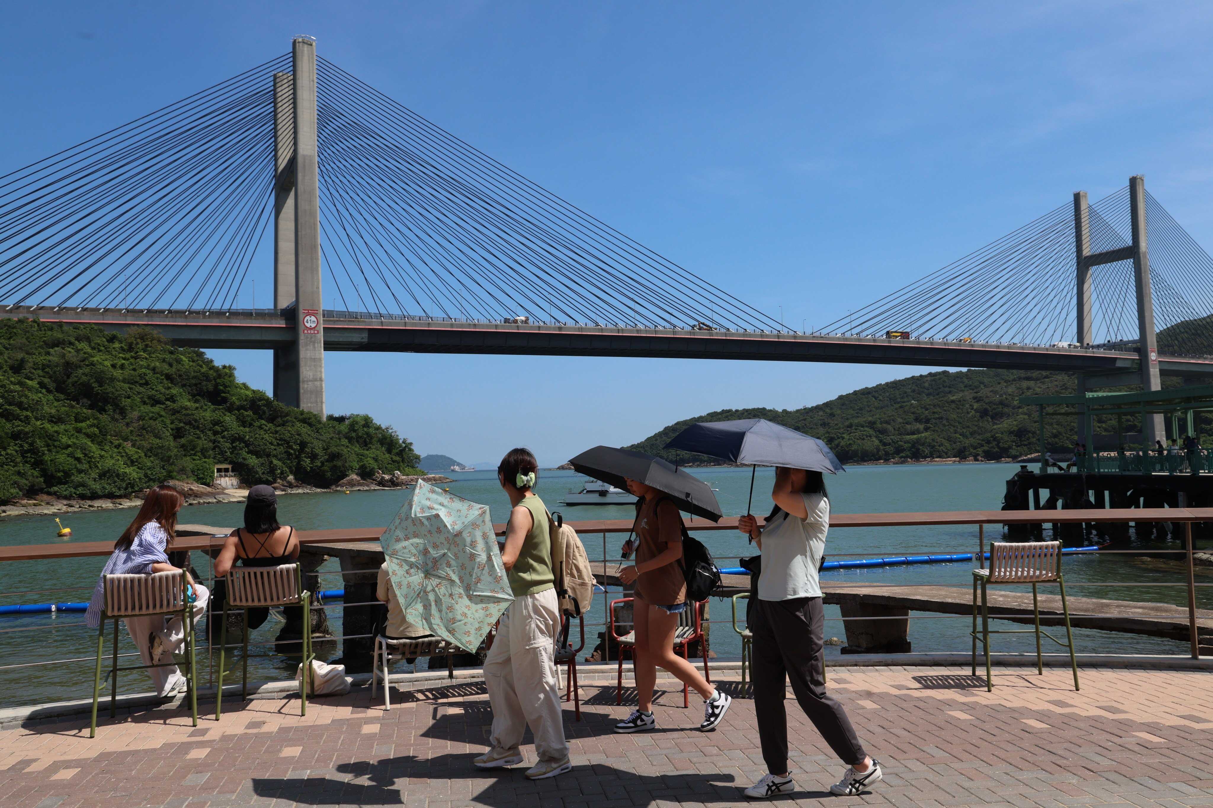 Visitors look out towards Ting Ma Bridge on Ma Wan island. Photo: Dickson Lee