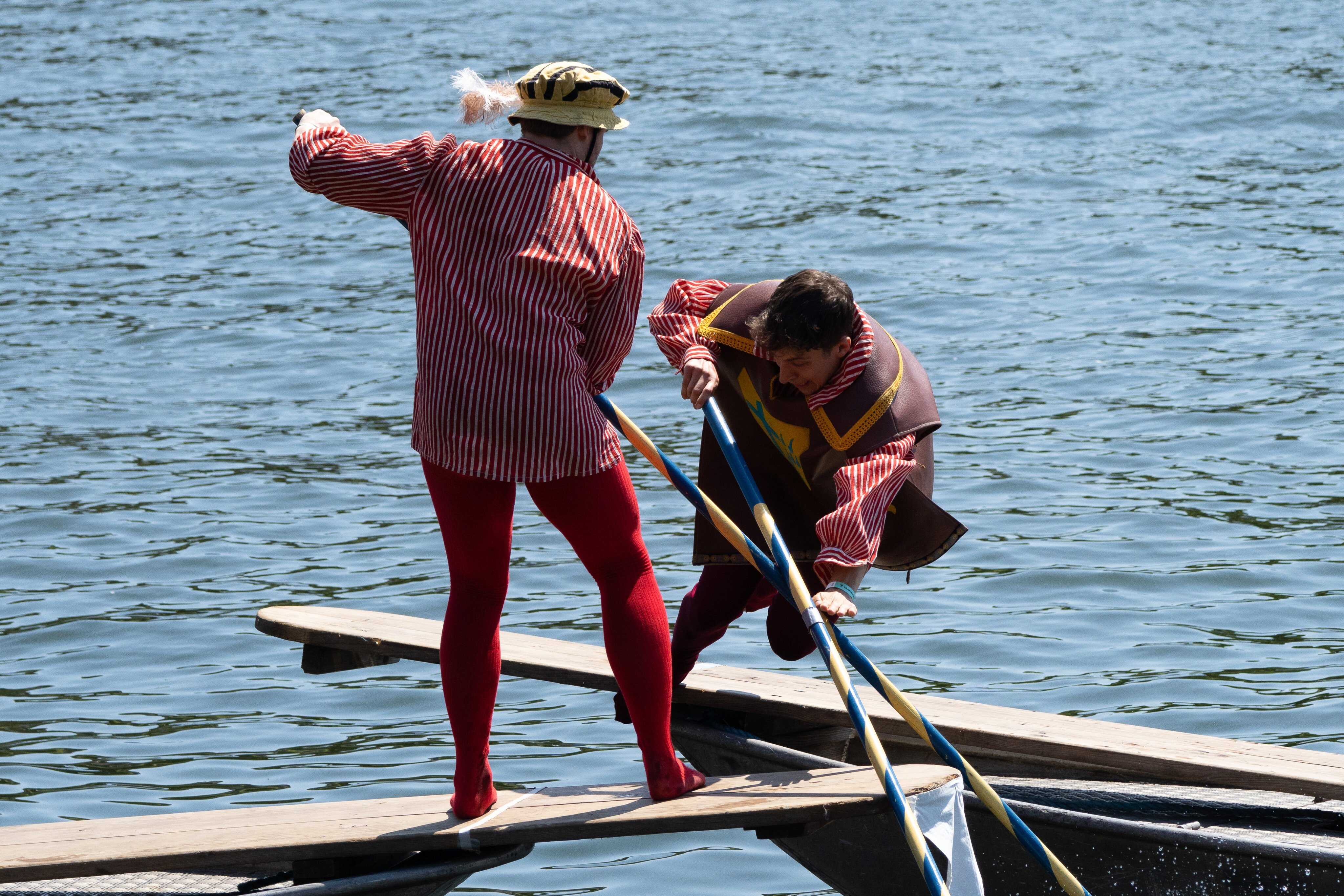Participants compete in the traditional Fischerstechen water joust in Frankfurt, Germany. Photo: EPA
