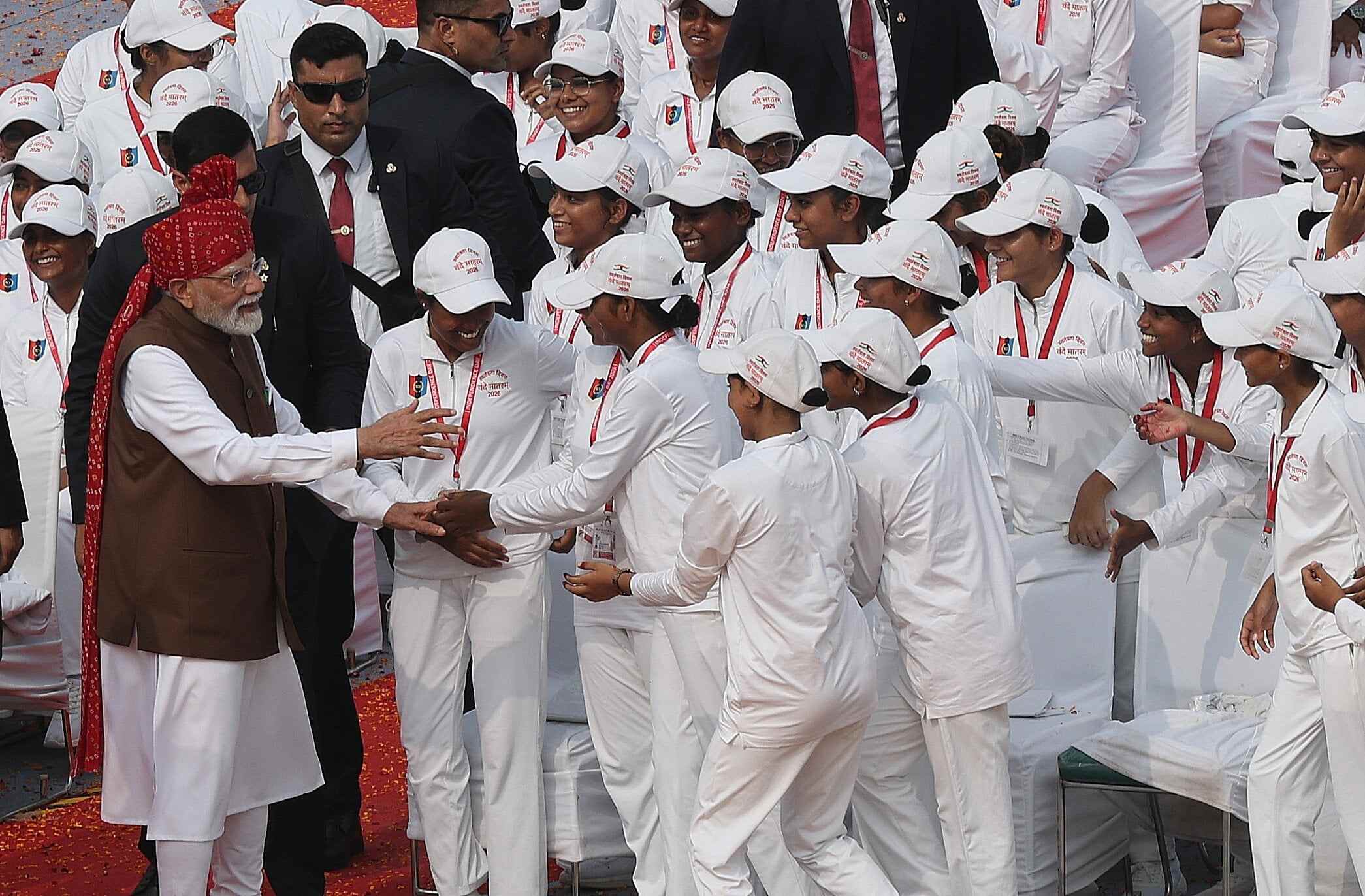 Indian Prime Minister Narendra Modi (left) greets school children after addressing the nation during Independence Day celebrations at the Red Fort in New Delhi. Photo: EPA