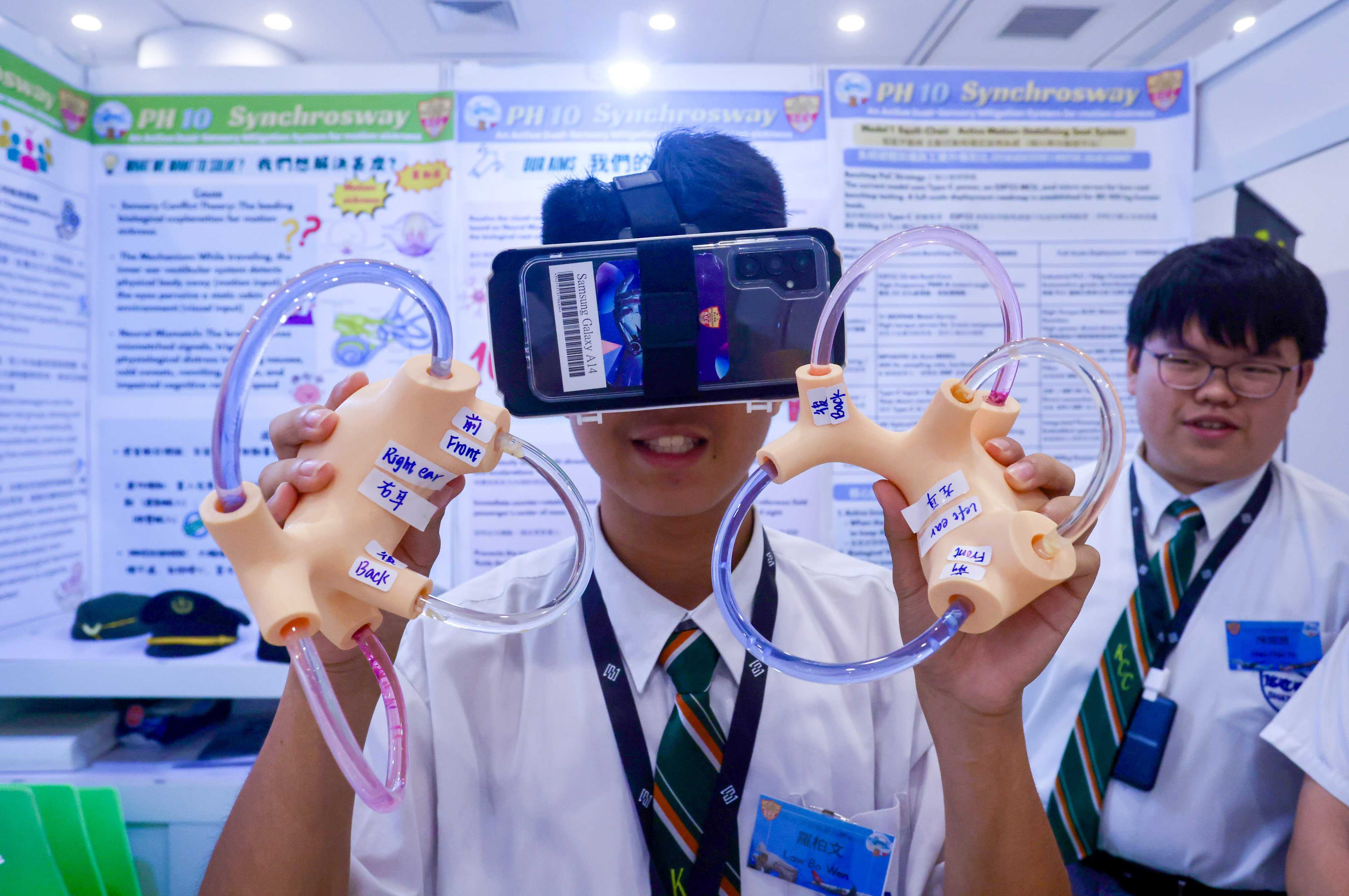 Students get some hands-on science experience at the 59th Joint School Science Exhibition earlier this month. Photo: Jonathan Wong