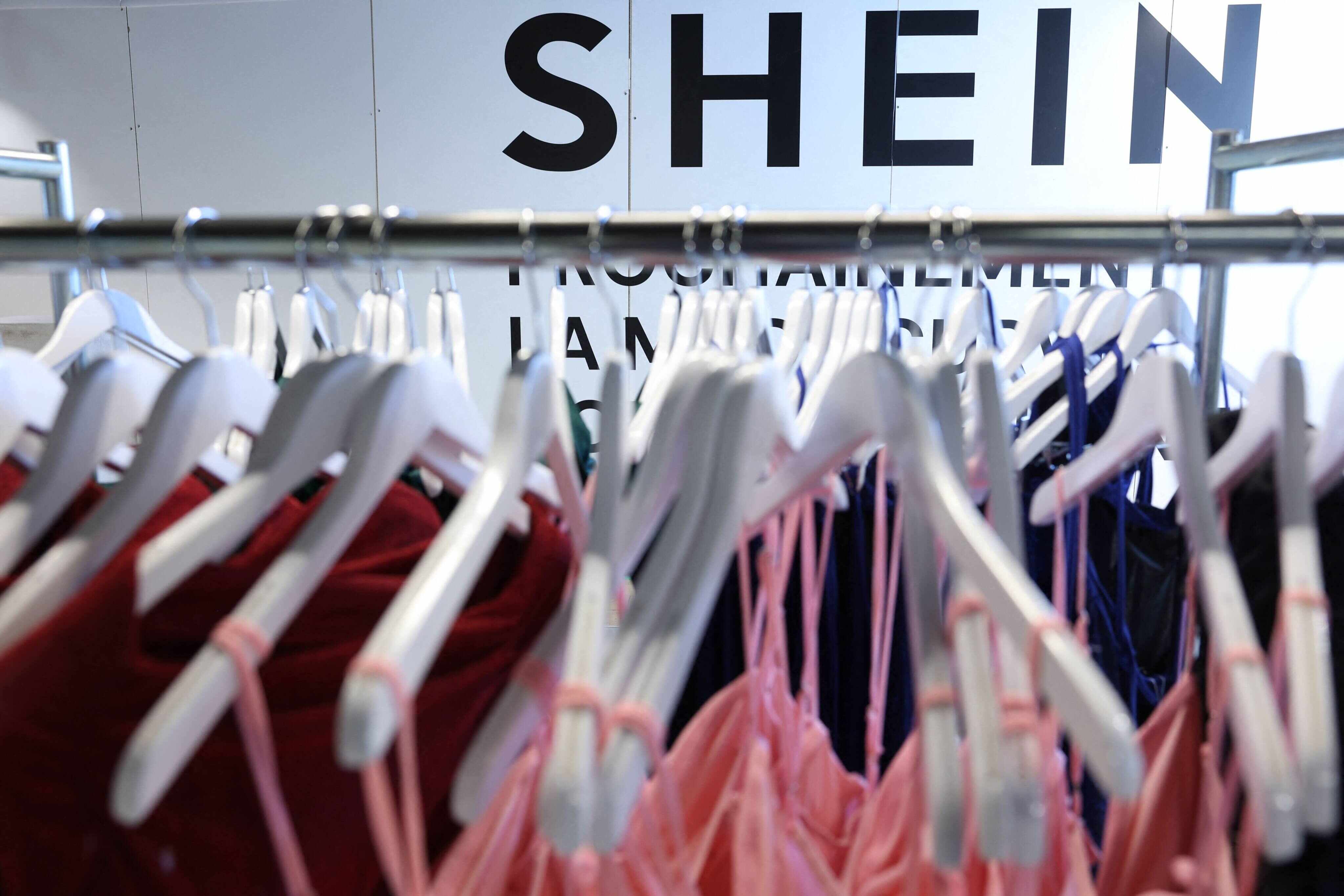 Shein’s Hong Kong listing highlights its fast-fashion success via social media, but faces scrutiny over labour practices and environmental impact. Photo: AFP