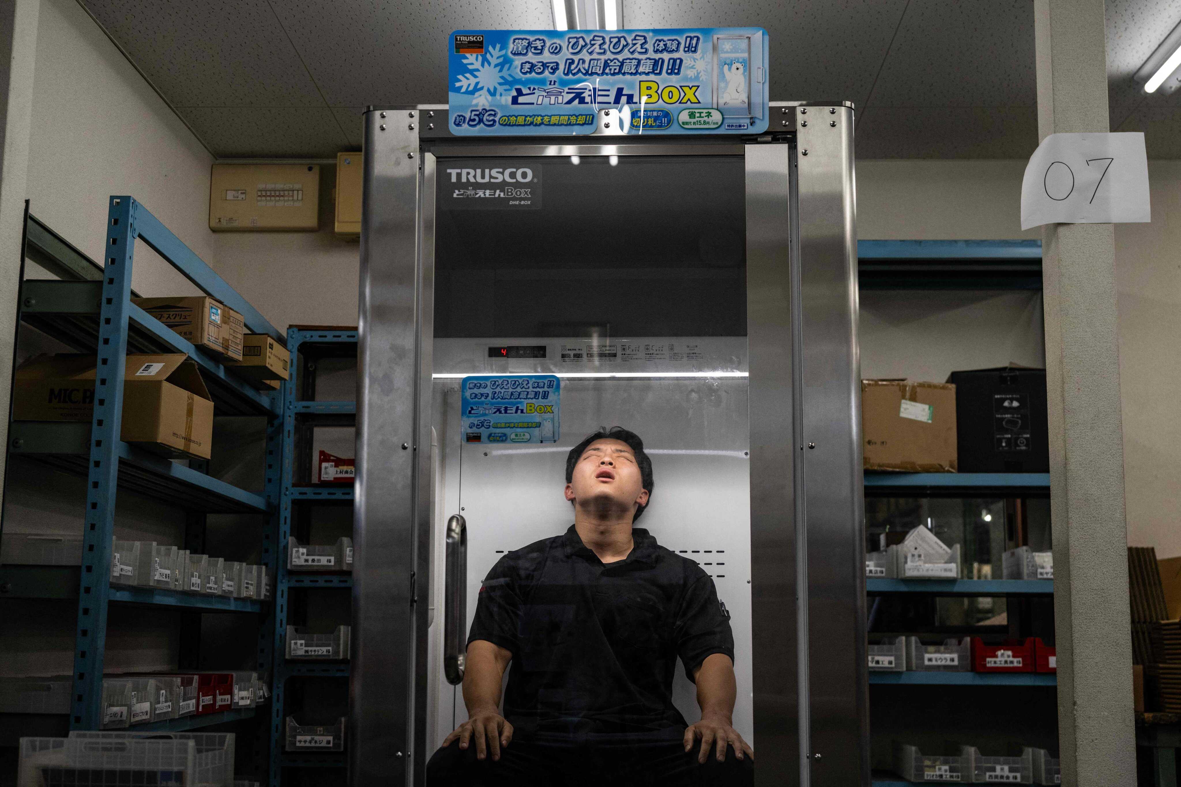 Beat the heat with Japan’s human refrigerator, the Do Hiemon Box, offering instant relief in extreme temperatures, vital for worker safety. Photo: AFP