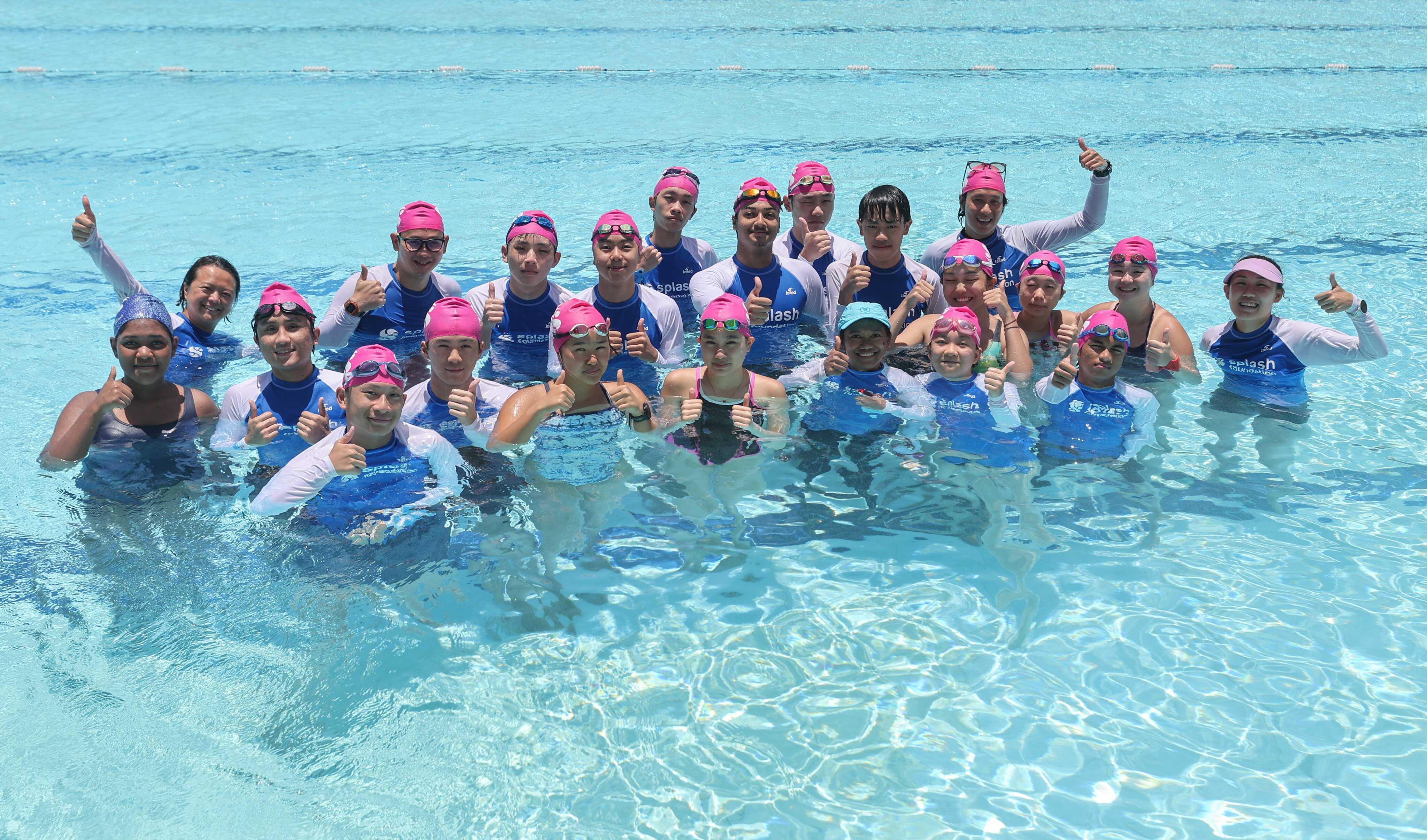 The new programme empowers teenagers to become swim coaches, passing on the important life skills and lessons. Photo: Edmond So