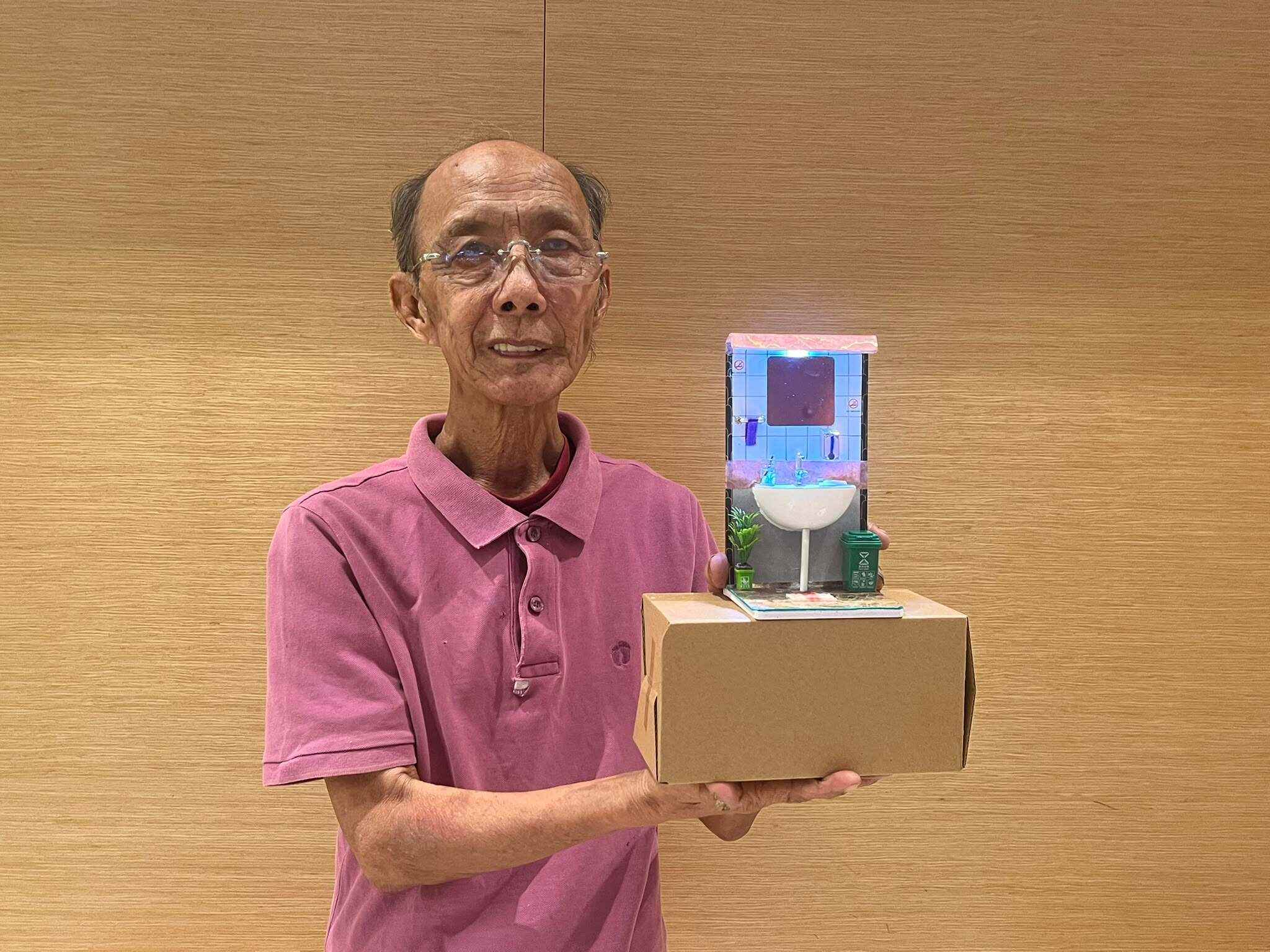 Uncle Richard turned his passion for and experience in design into crafting miniature toilet models. Photo: Doris Wai