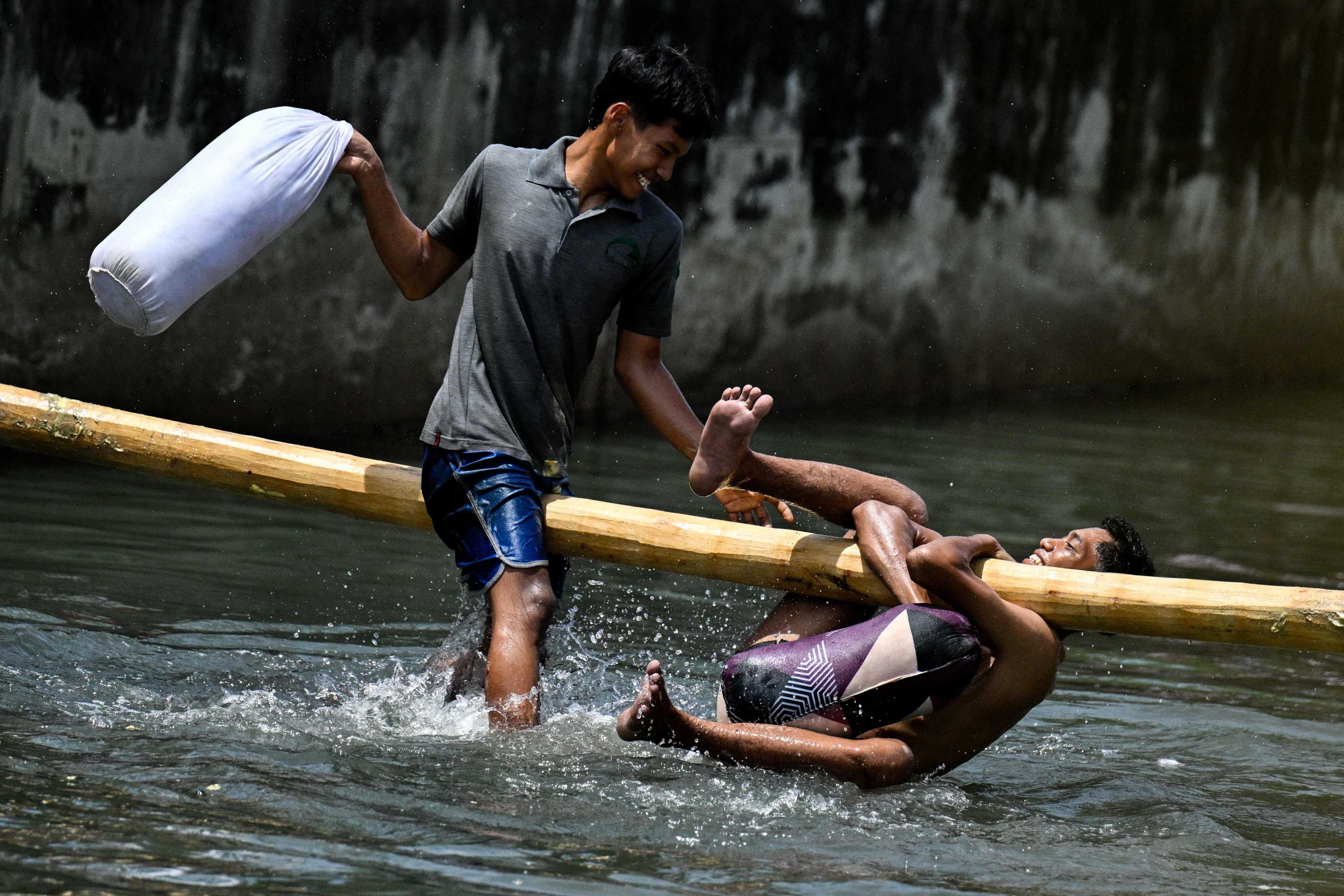 Young people take part in a pillow fight during celebrations to mark Indonesia’s 81st Independence Day in Banda Aceh on August 17, 2026. Photo: AFP