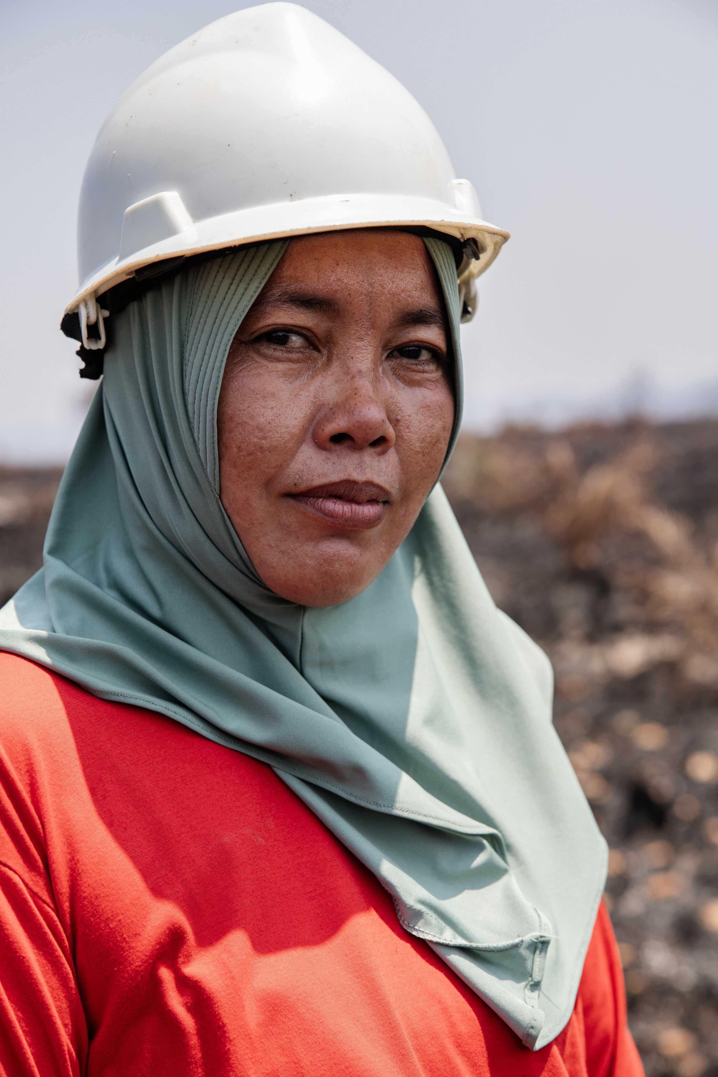 Irma is a member of the Power of Mama team that heads out every day during the dry season to battle blazes in Indonesia. Photo: Garry Lotulung