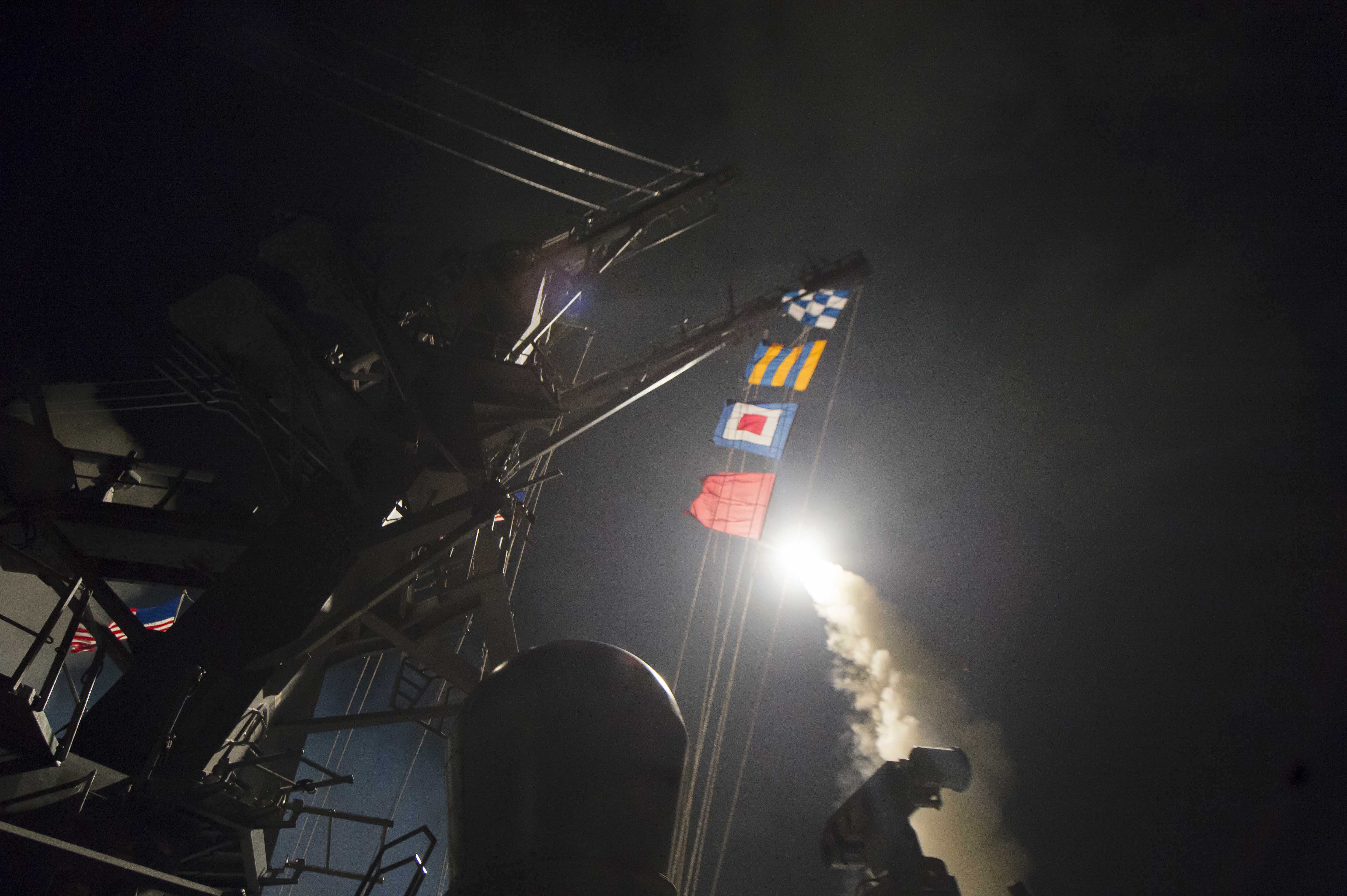 The USS Ross fires a tomahawk land attack missile April 7, 2017, at a Syrian air force airfield.