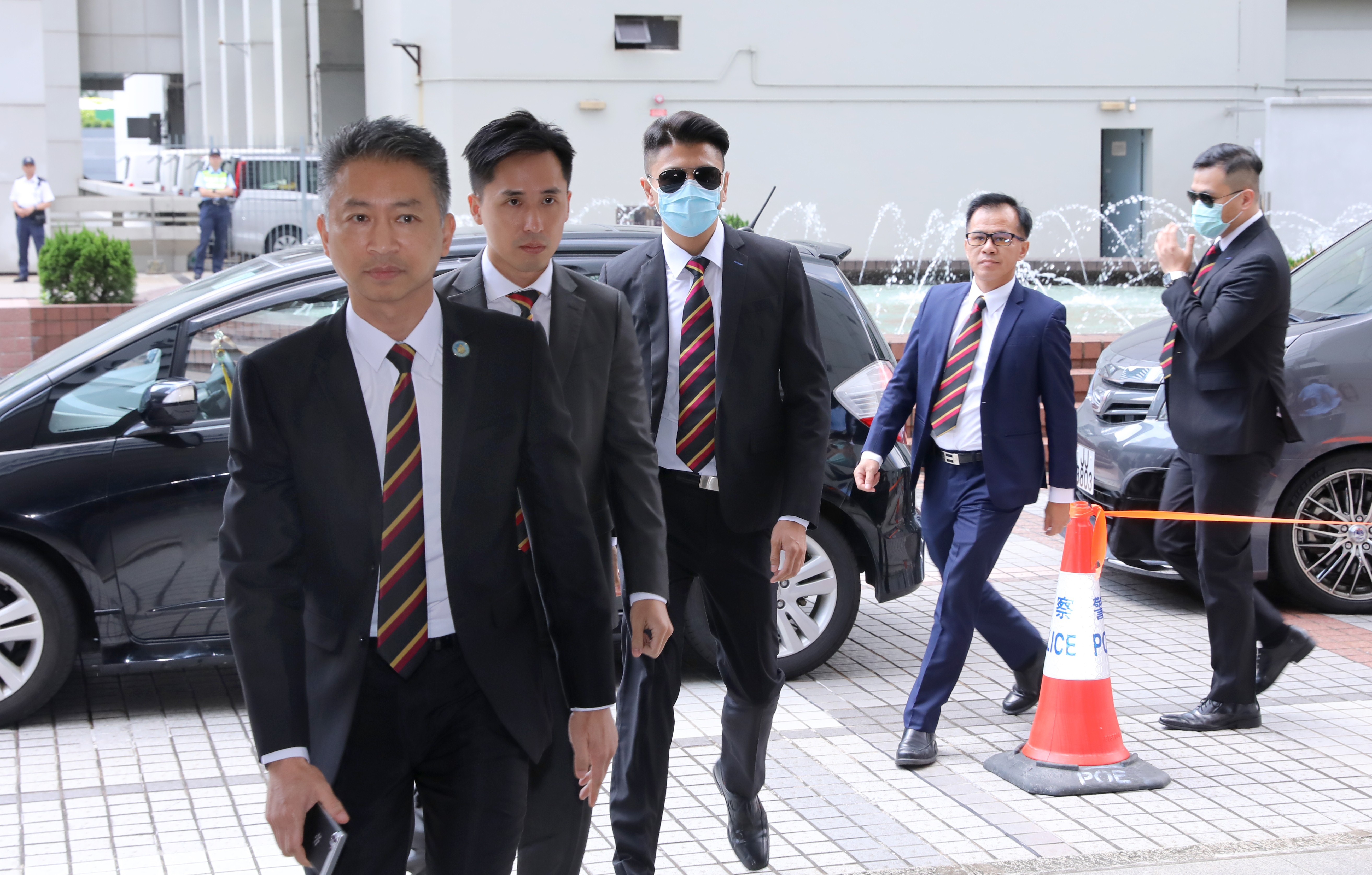 (From left) Wong Cho-shing, Lau Cheuk-ngai, Wong Wai-ho, Pak Wing-bun and Lau Hing-pui arrive at the High Court on Friday.