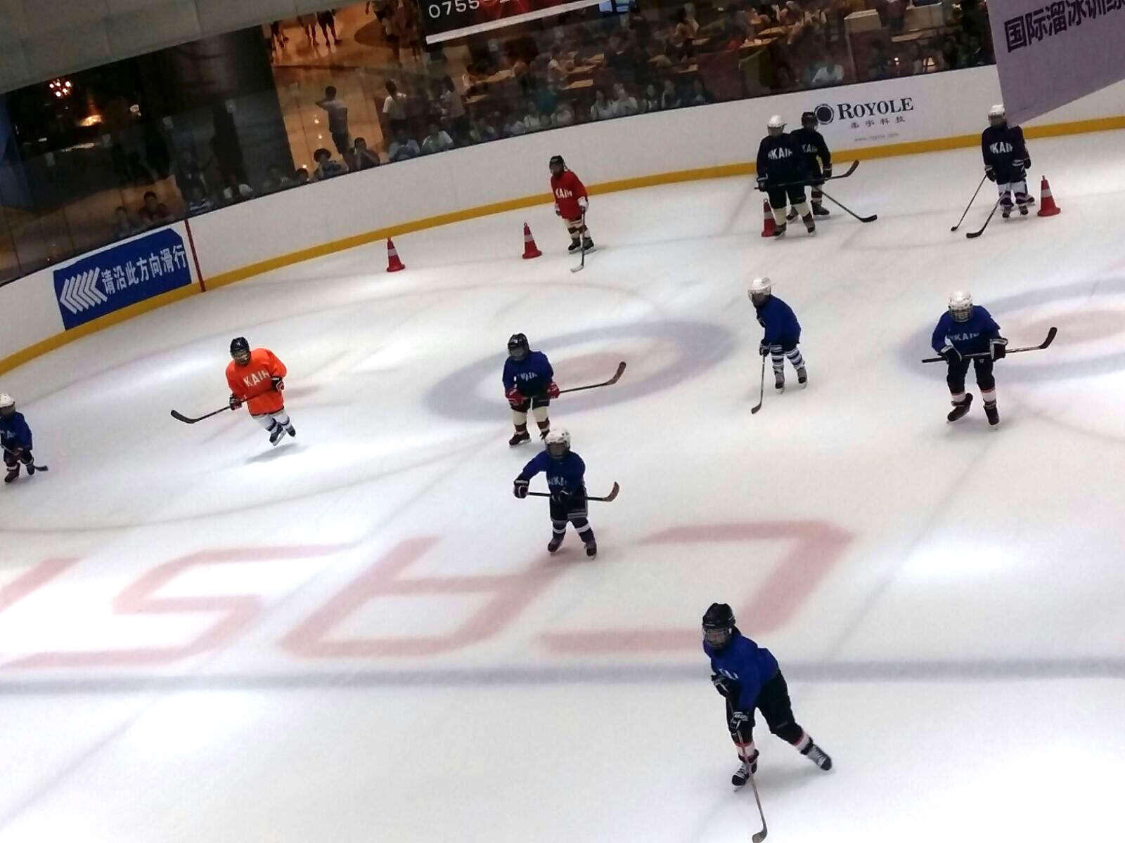Ice hockey players get their skates on as they attend a summer camping trip.