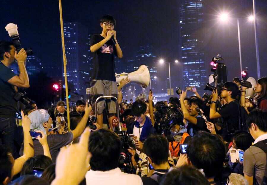 Joshua Wong delivers a speech outside the chief executive's office in Admiralty during the Occupy protests in 2014. 