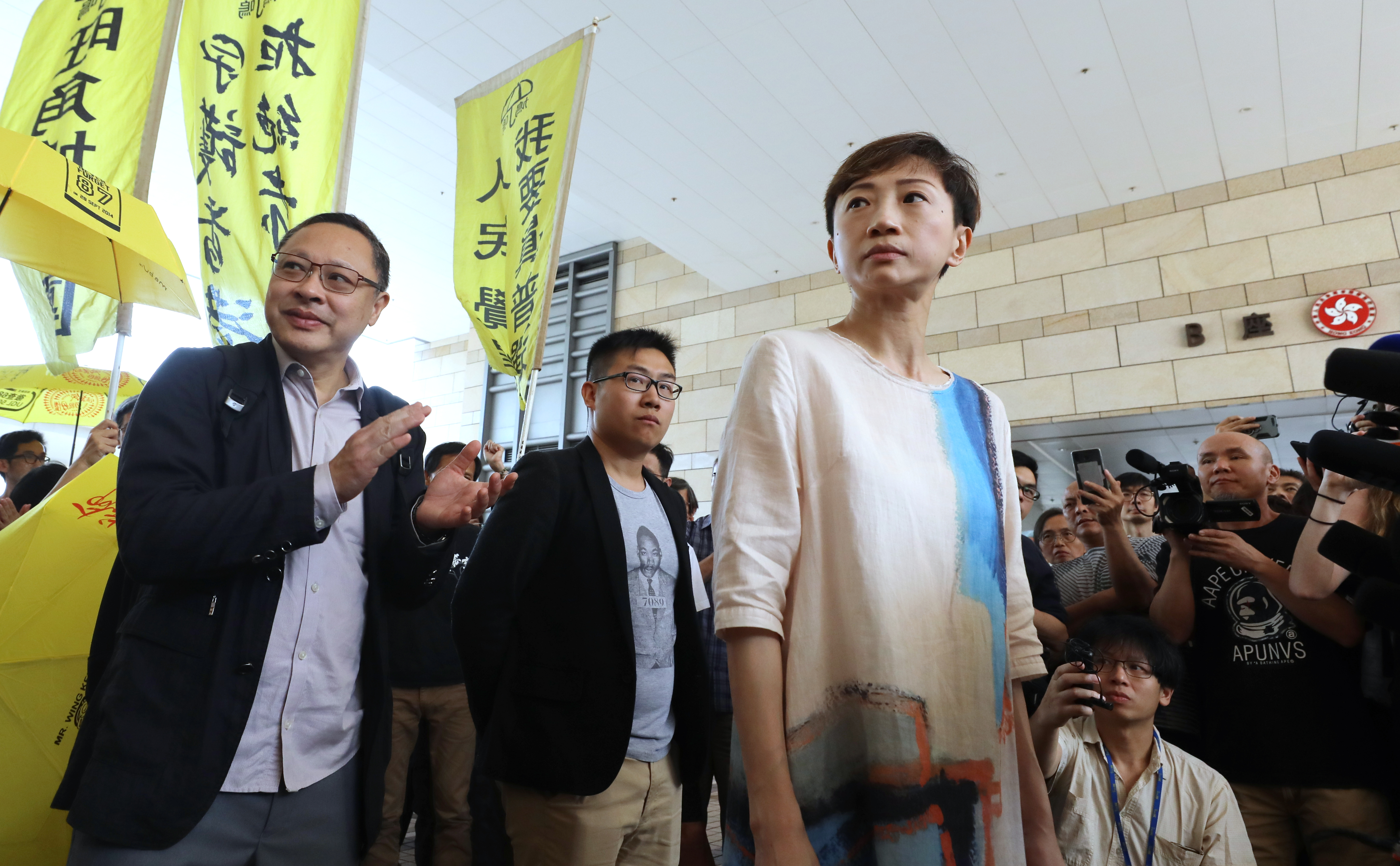 Legislator Tanya Chan Suk-chong (right) was revealed to require urgent surgery for a illness at the sentencing. 