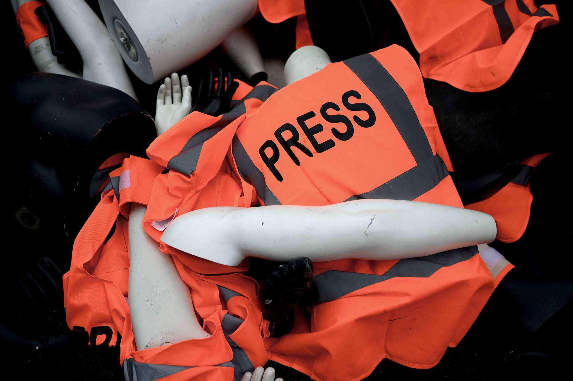 A file photo taken in front of the Saudi consulate in Neuilly-sur-Seine, west of Paris on October 1, 2019 shows dummies with press armbands and jackets piled up by members of Reporters Without Borders during a protest to mark the anniversary of the death of journalist Jamal Khashoggi. Photo: AFP