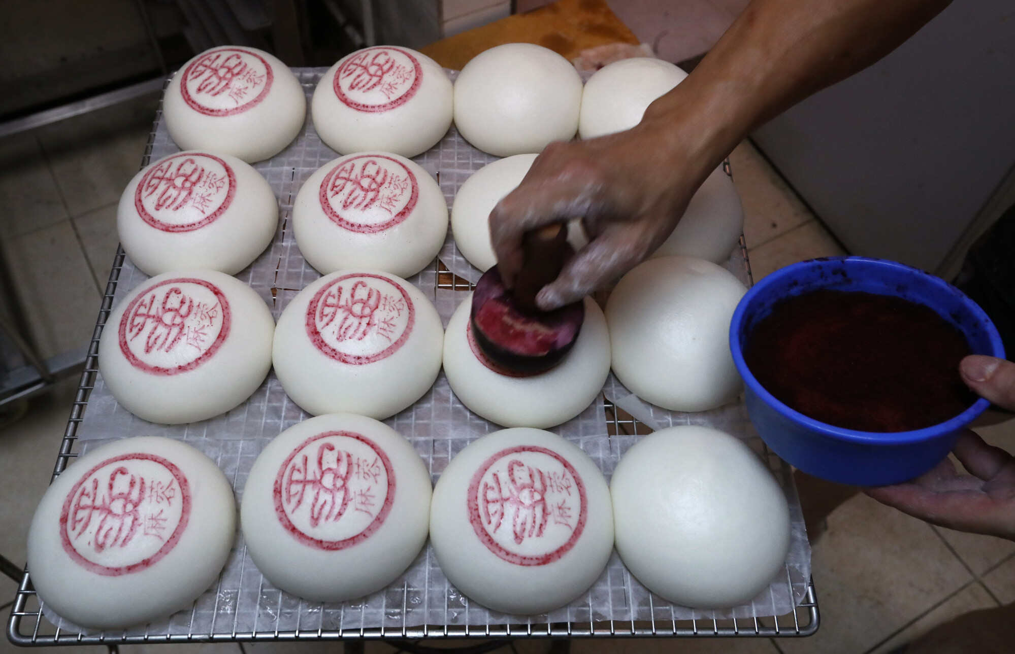 “Ping on” buns are the signature delicacy of Cheung Chau’s annual bun-scrambling festival on Buddha’s Birthday. Photo: Nora Tam