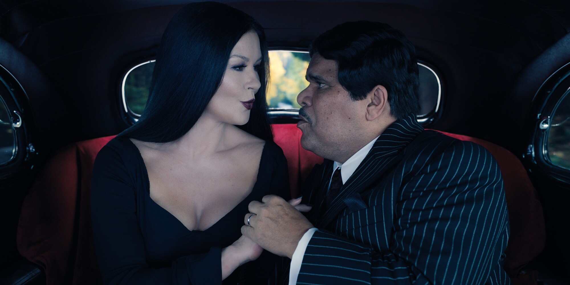 Catherine Zeta-Jones, left, and Luis Guzman play Wednesday’s parents, Morticia and Gomez Addams. Photo: Netflix/TNS