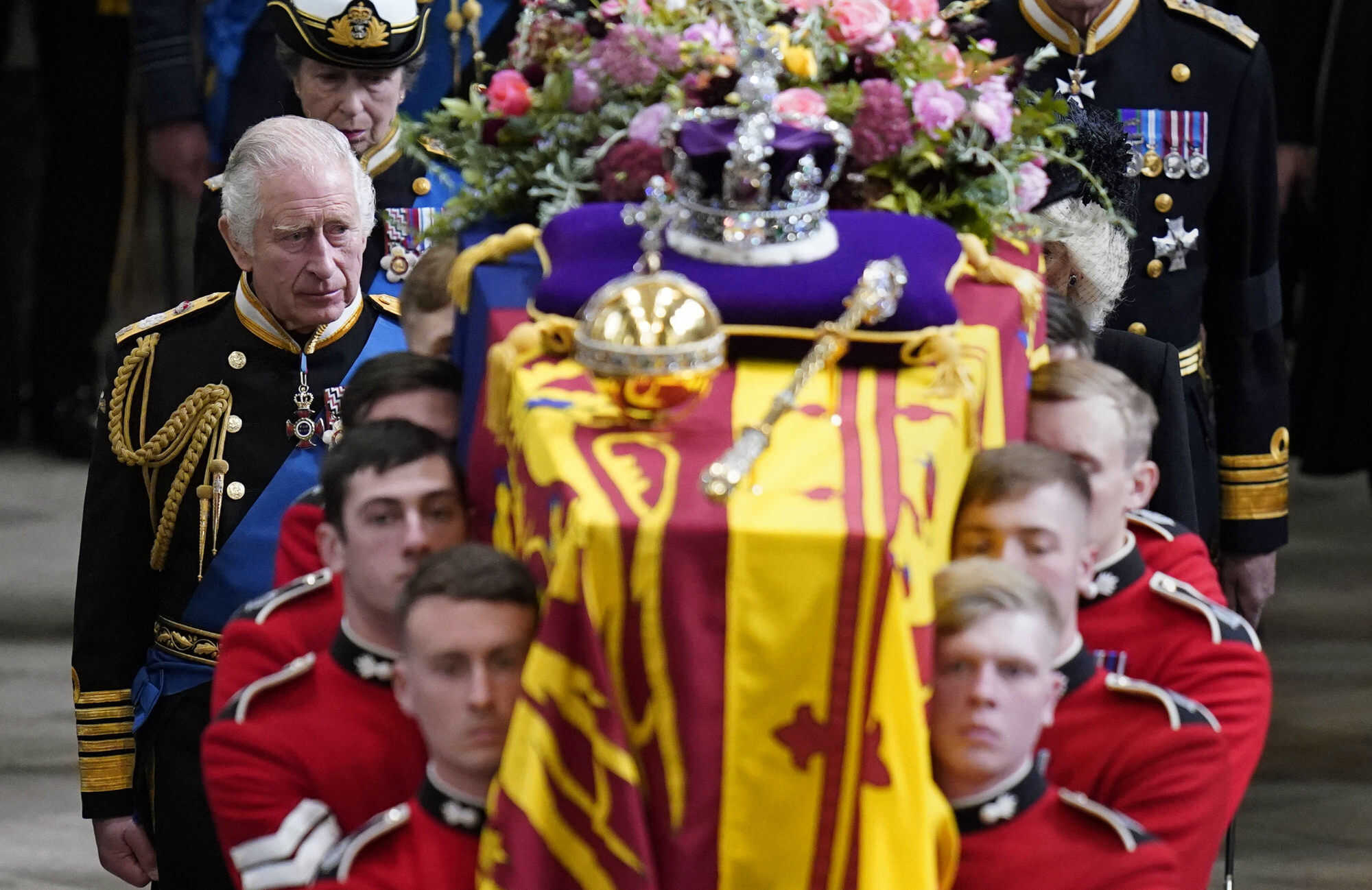 King Charles and members of the royal family follow Queen Elizabeth’s coffin as it is carried out of Westminster Abbey after her state funeral in London on September 19, 2022. Photo: AP
