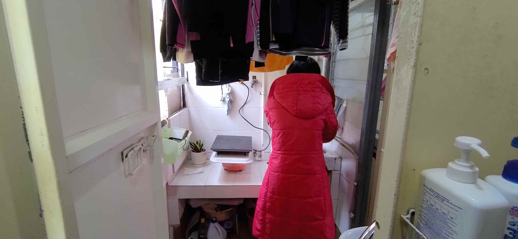 Lau, 46, lives by herself in Shek Lei interim housing, where she is only a 10-minute walk away from where her ex-spouse and daughter reside. Photo: Handout