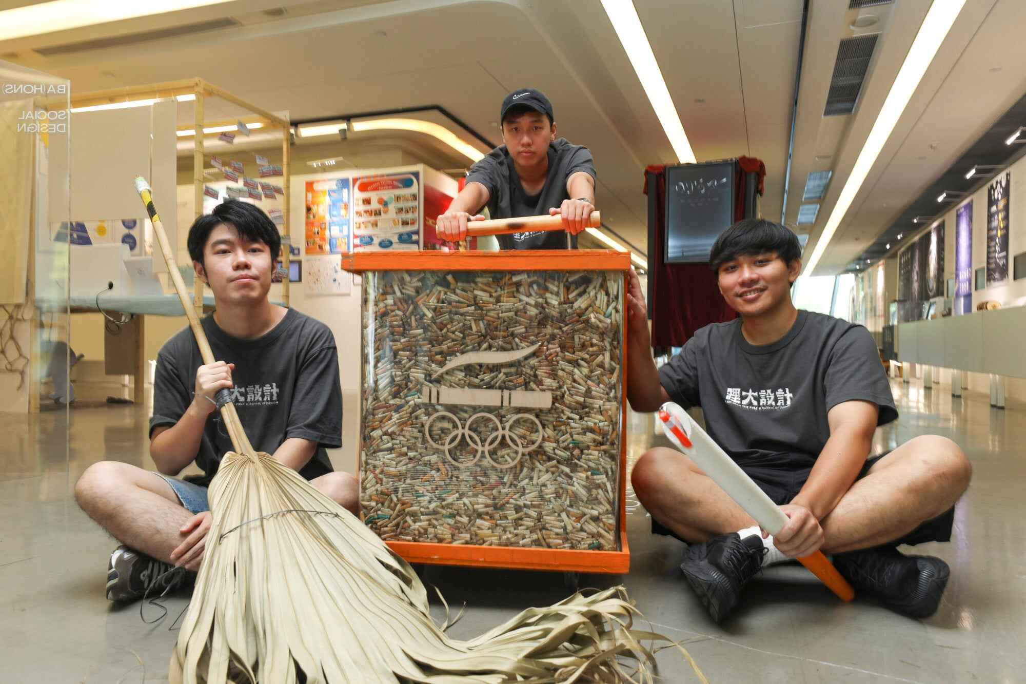Social design students Oscar Lau (from left), Krson Ho, Sam Tang have collected more than 100,000 cigarette butts as part of their project to raise awareness of littering’s impact on street cleaners. Photo: Xiaomei Chen