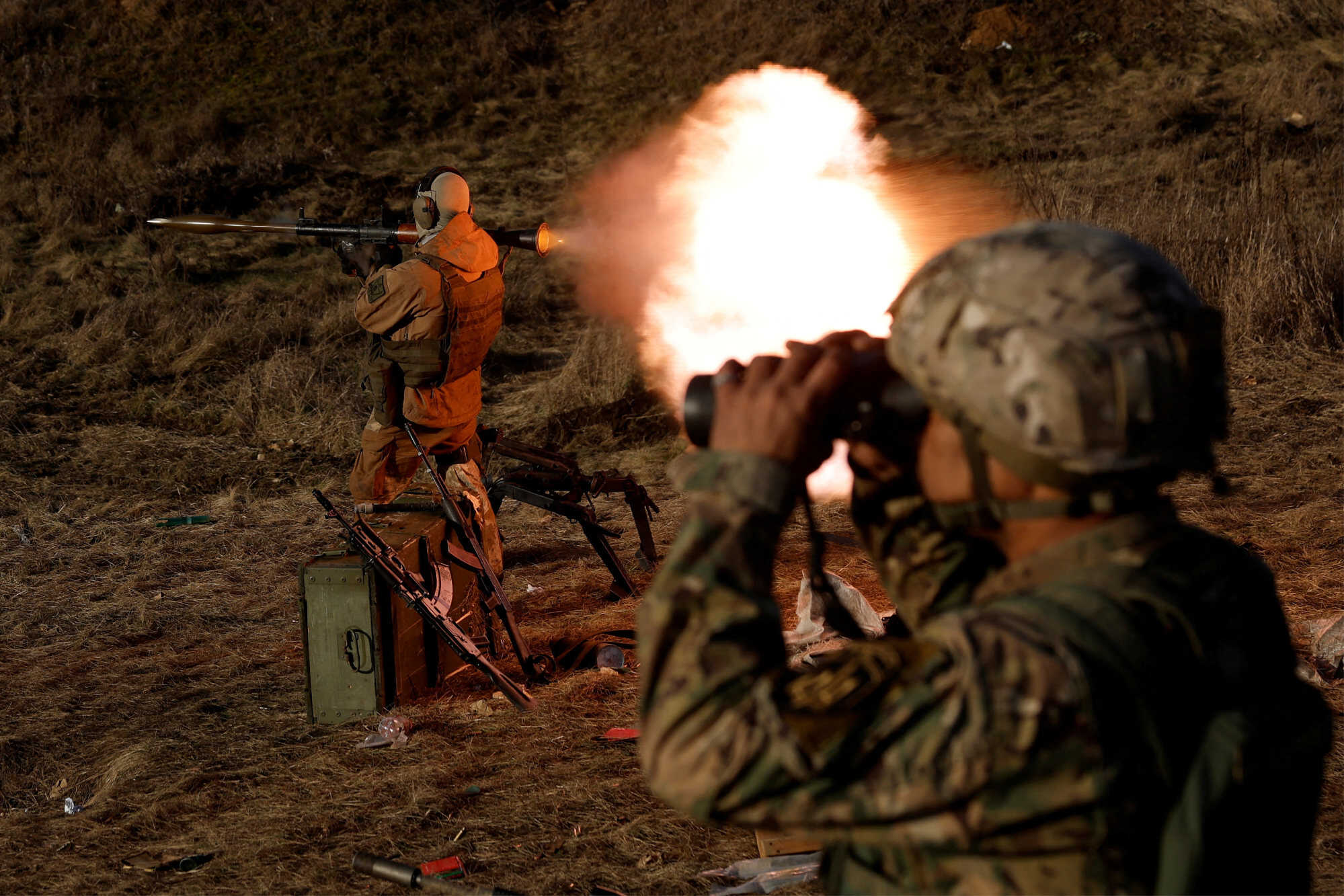 A soldier from the Carpathian Sich international battalion fires an RPG while conducting manoeuvres near the front line in Kreminna, Ukraine on January 3, 2023. Many people are mistaking a video game called “Arma 3” for footage from the invasion. Photo: Reuters