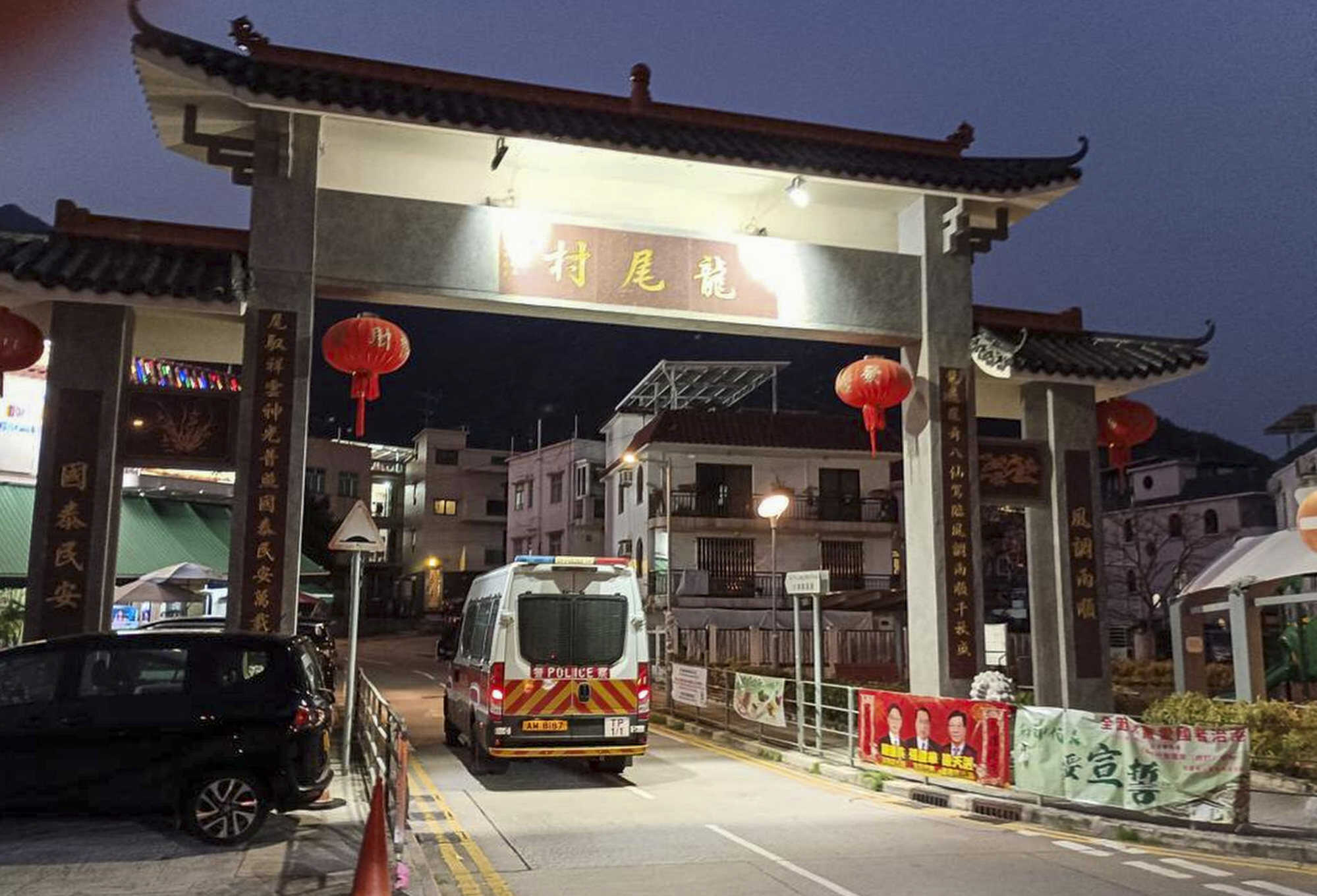 Police search a village house at Lung Mei Tsuen in Tai Po on Friday. Photo: Handout