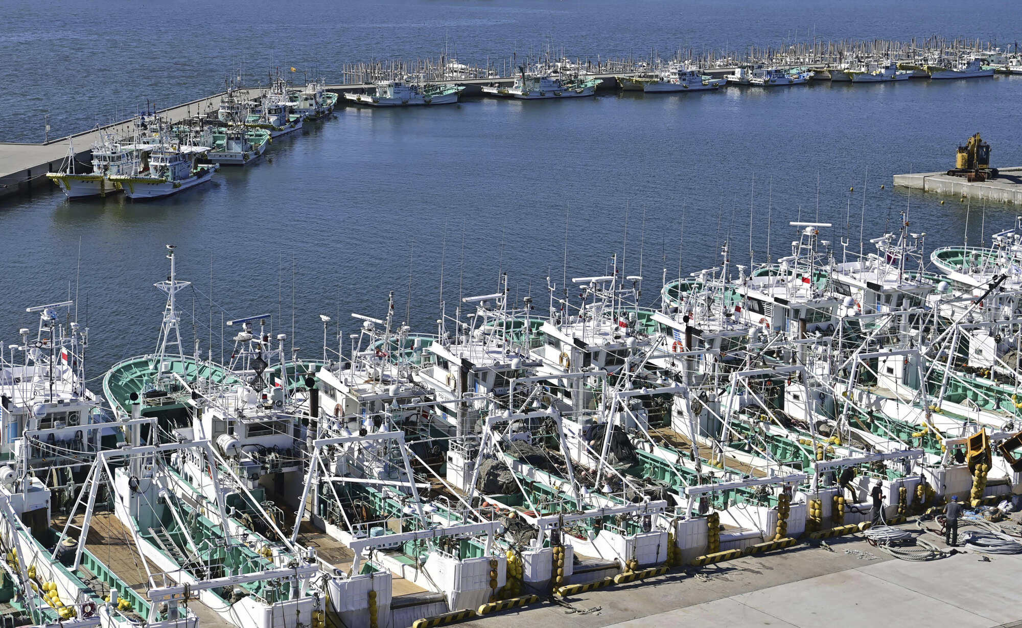 Fishing boats line up at a port in Soma, Fukushima prefecture, Japan on August 22, 2023. Photo: Kyodo News via AP