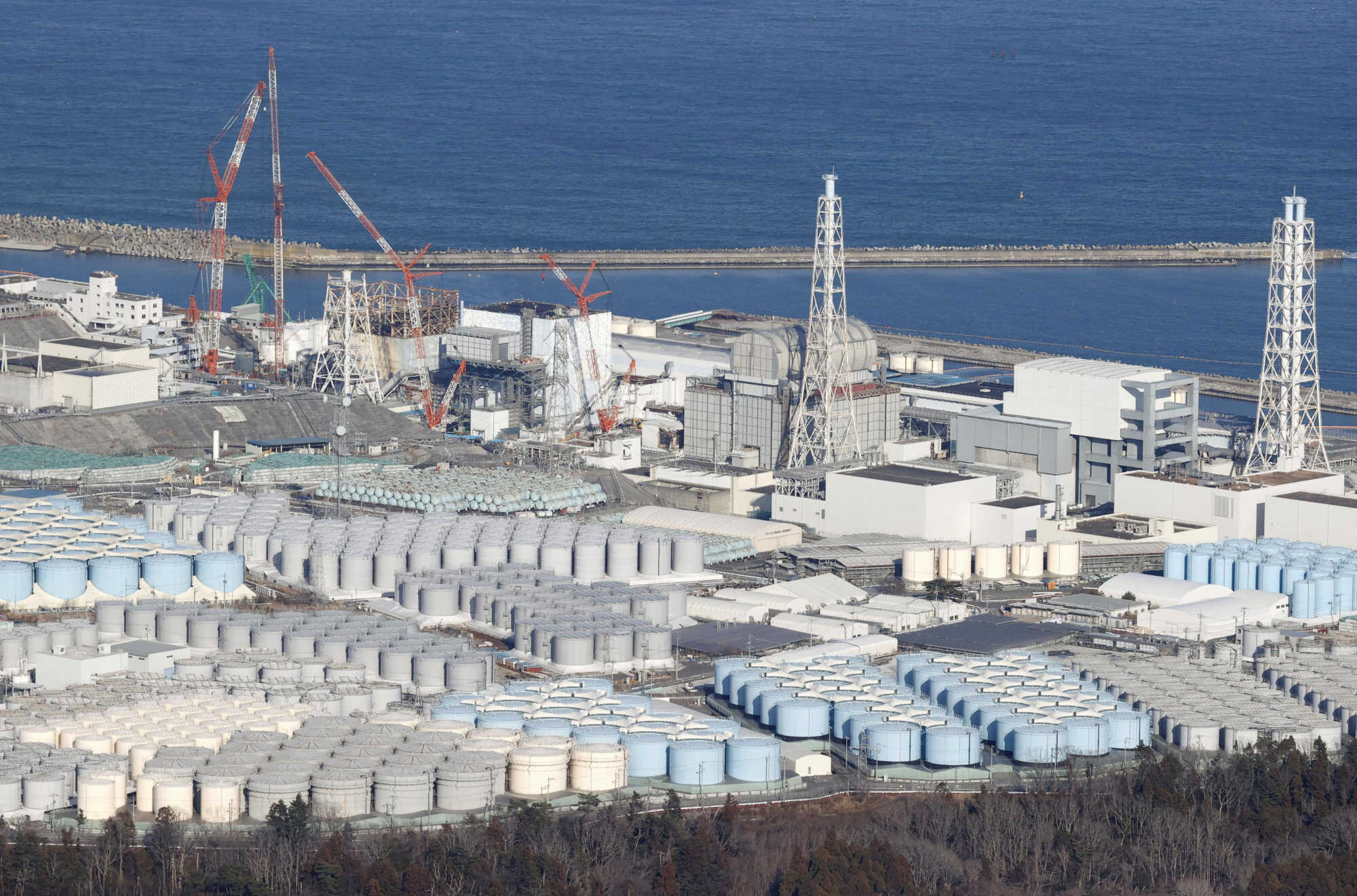 An aerial view shows the storage tanks for treated water at the tsunami-crippled Fukushima Daiichi nuclear power plant in Okuma town, Fukushima prefecture, Japan on August 22, 2023. Photo: Kyodo via Reuters