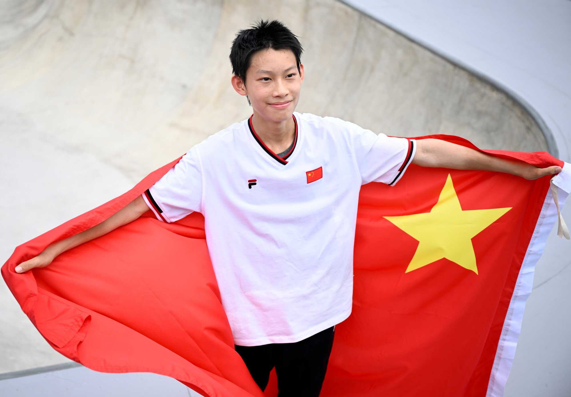 Chen Ye of China became the youngest Chinese champion with a gold in the men’s park skateboarding. Photo: Xinhua