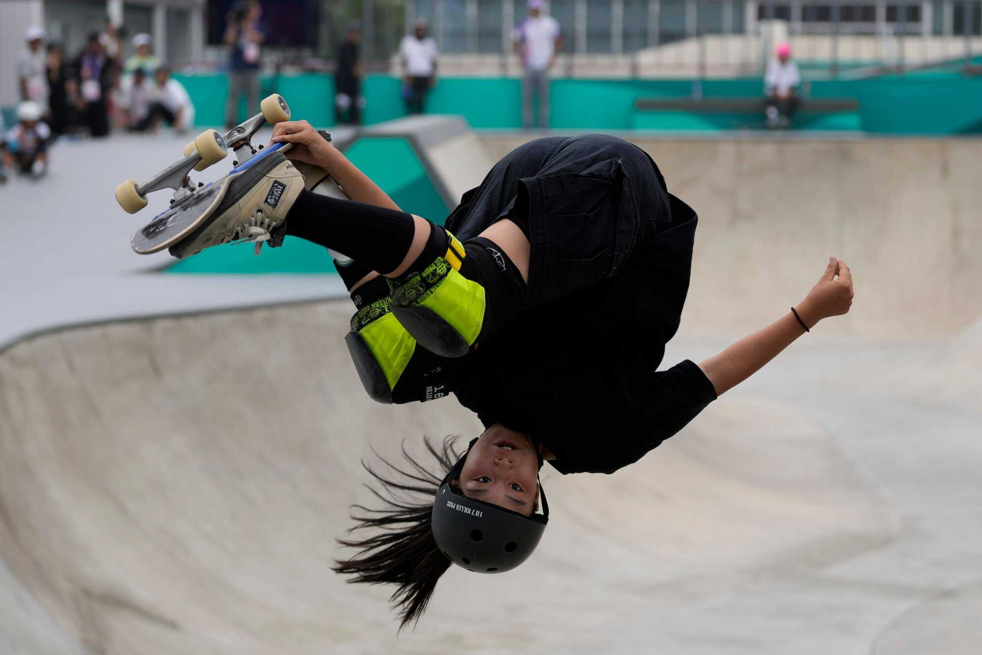 Japan’s Hinano Kusaki clinched gold in the skateboarding women’s park final. Photo: AP