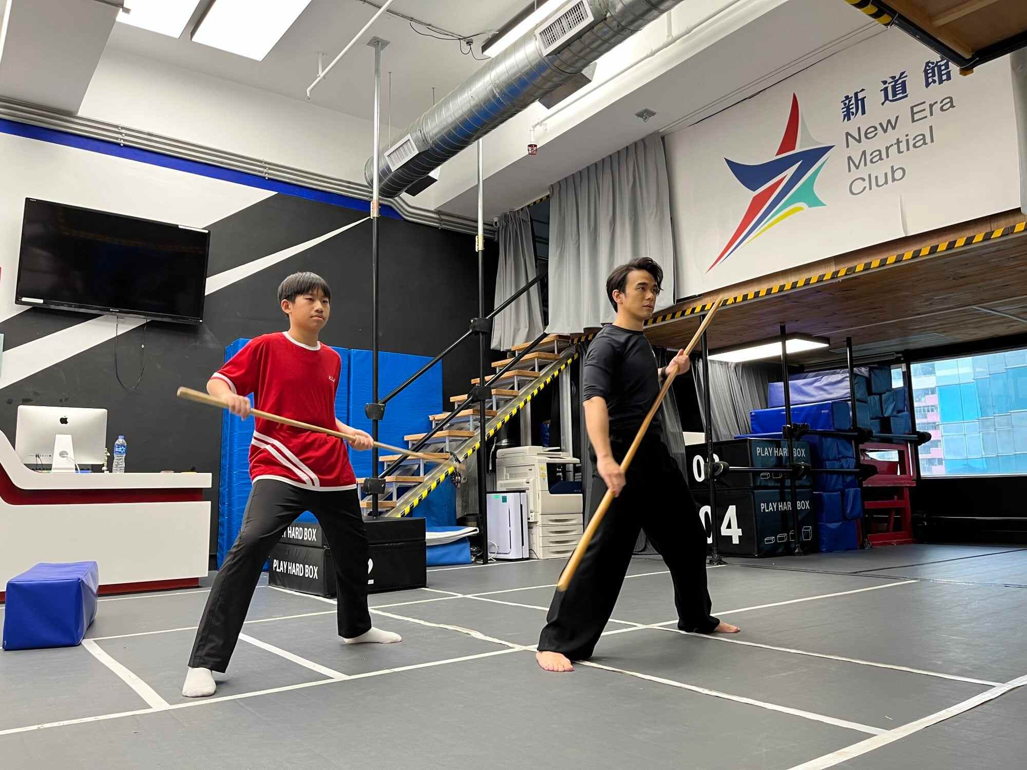 Pong works with 11-year-old Hanson Huang Peng, who joined his course three months ago. Photo: Sue Ng