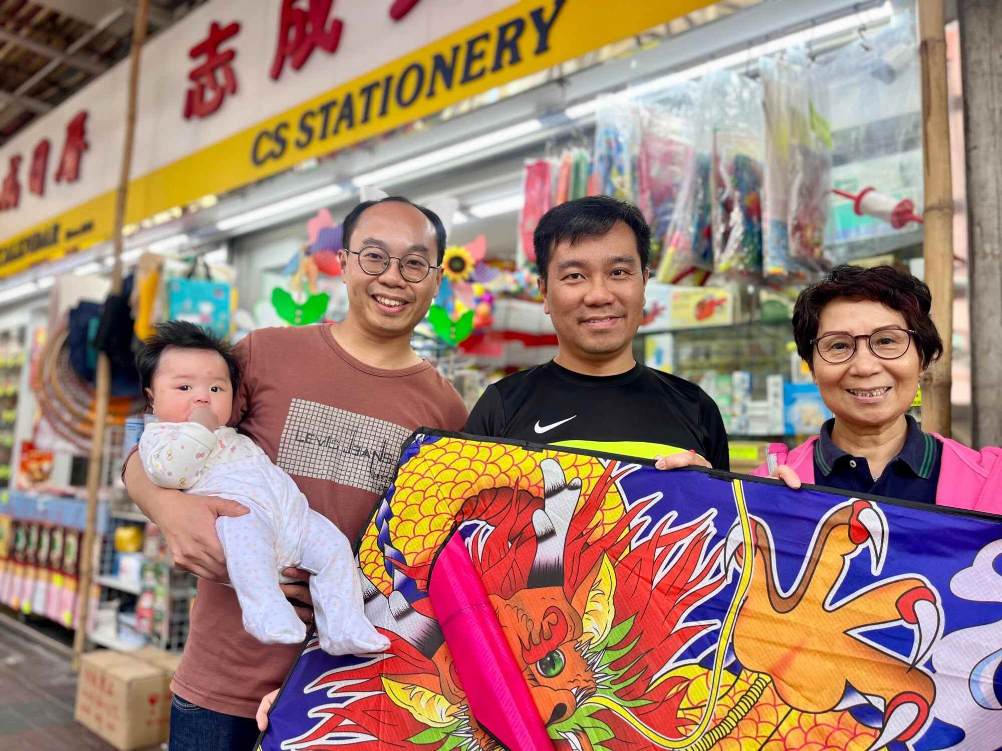 CS Kites in Mong Kok district is a family-run business that was started by Mrs Mak (right) and her husband more than 40 years ago. Her sons Benny (left) and Jack also help out. Photo: Kylie Knott