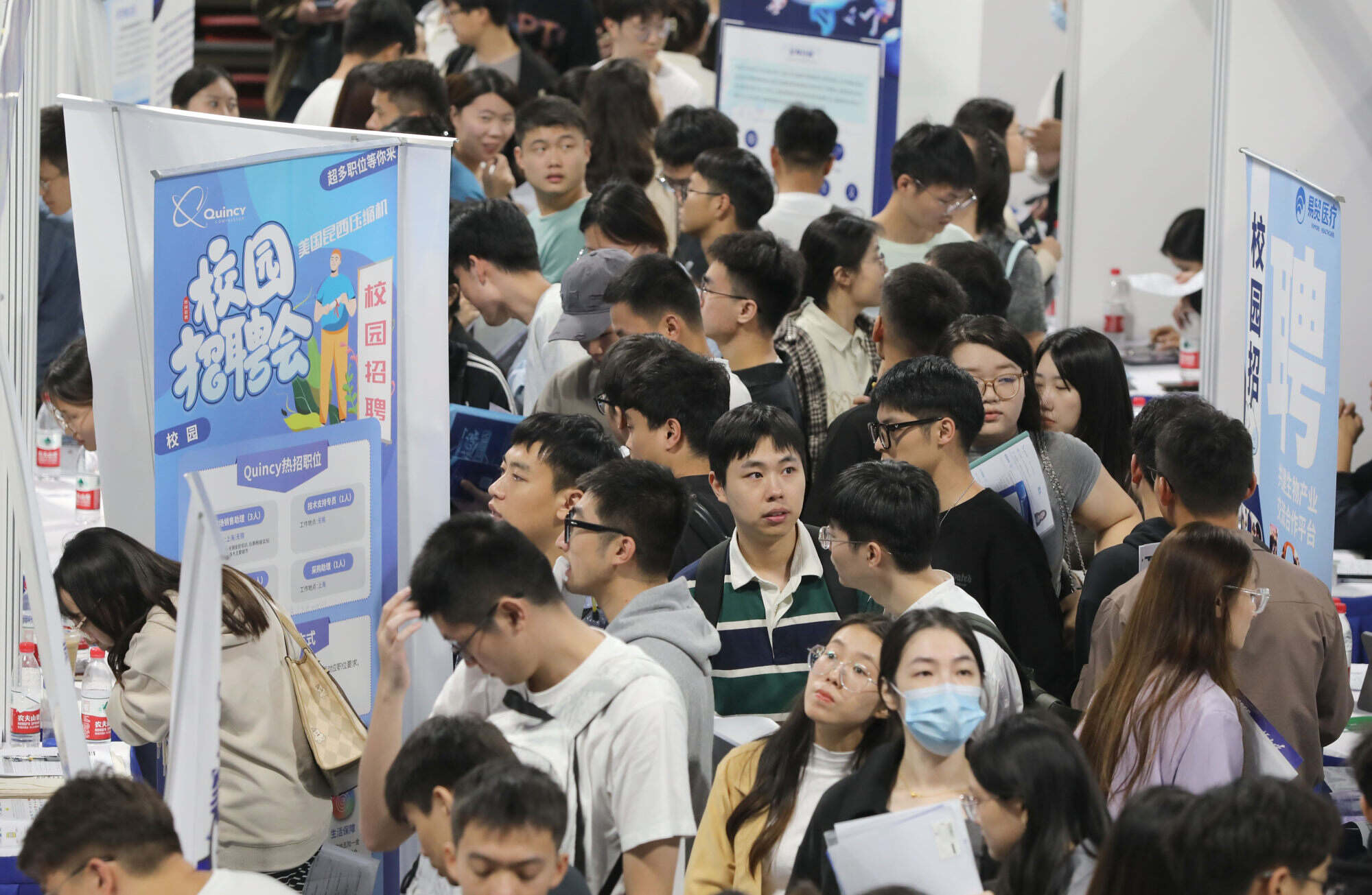 College graduates attend a job fair in Shanghai in October 2023. Photo: Xinhua