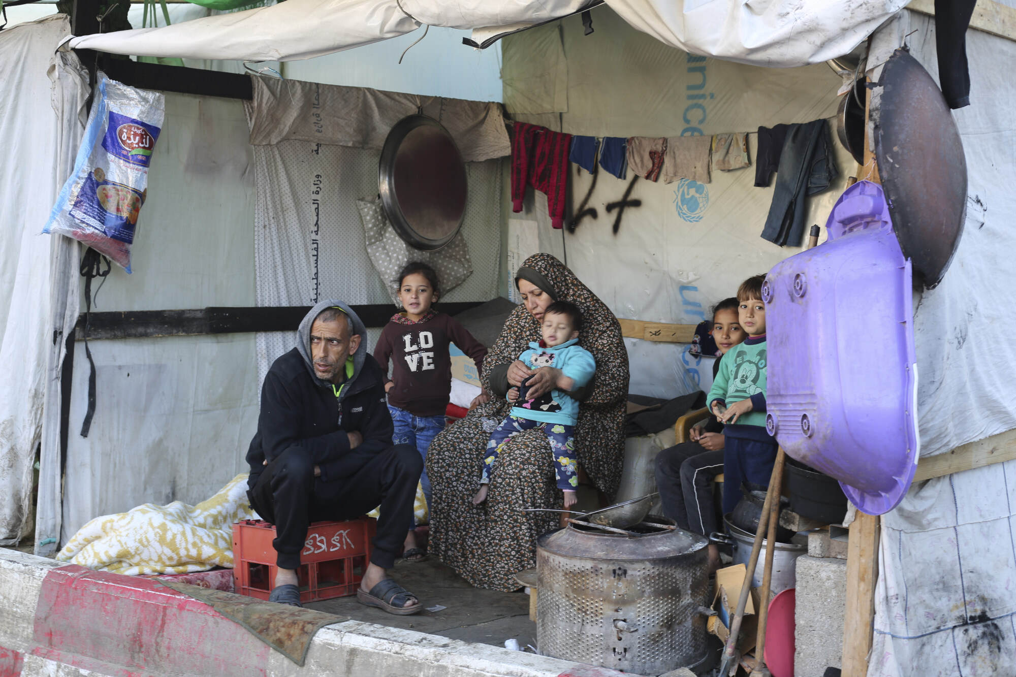 Many Palestinians, who have been forced to leave their homes by Israel’s attack on Gaza, take shelter at the European Gaza Hospital. Photo: AP